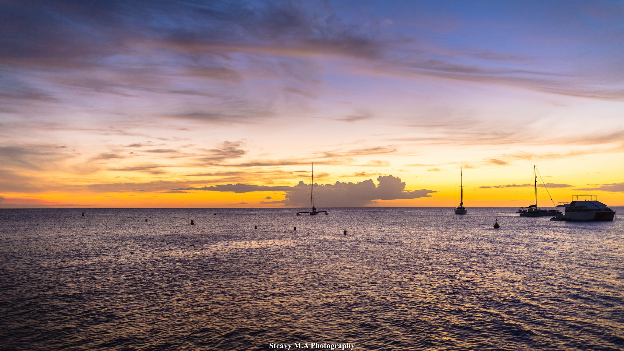 Canon EF 35mm F1.4L II USM sample photo. Sunset & boats photography