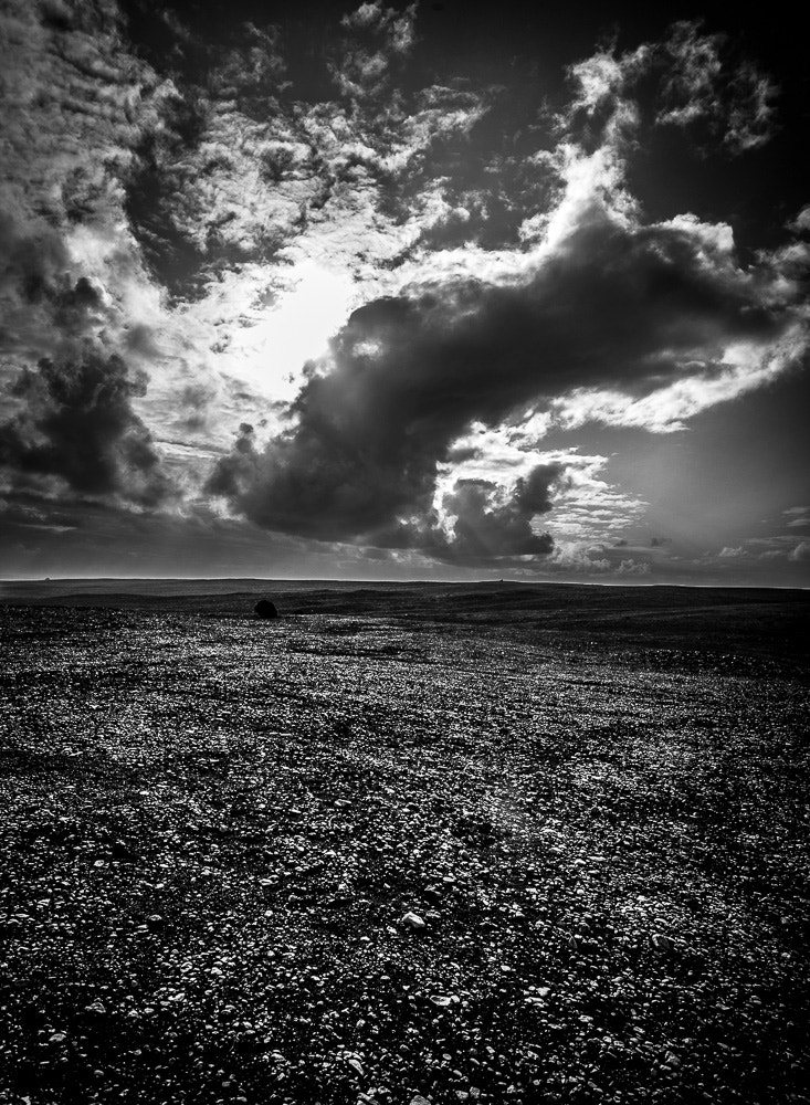 Leica Tri-Elmar-M 16-18-21mm F4 ASPH sample photo. Sun on the lava field beach photography