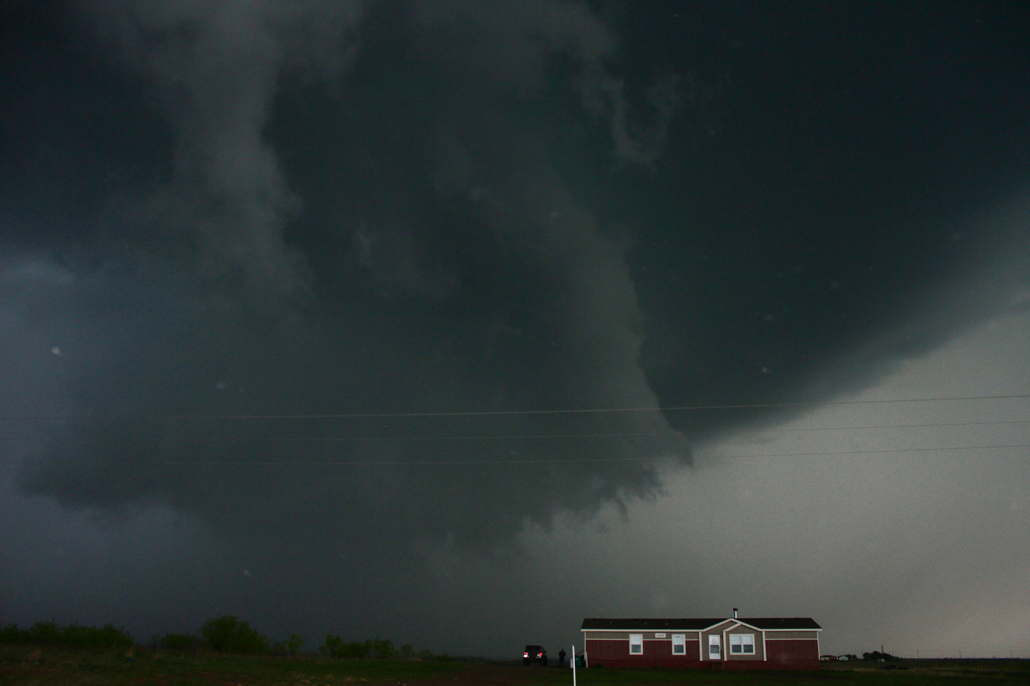 Canon EF-S 18-55mm F3.5-5.6 IS II sample photo. Nervous home owner watches as severe storm passes by in southern oklahoma. photography