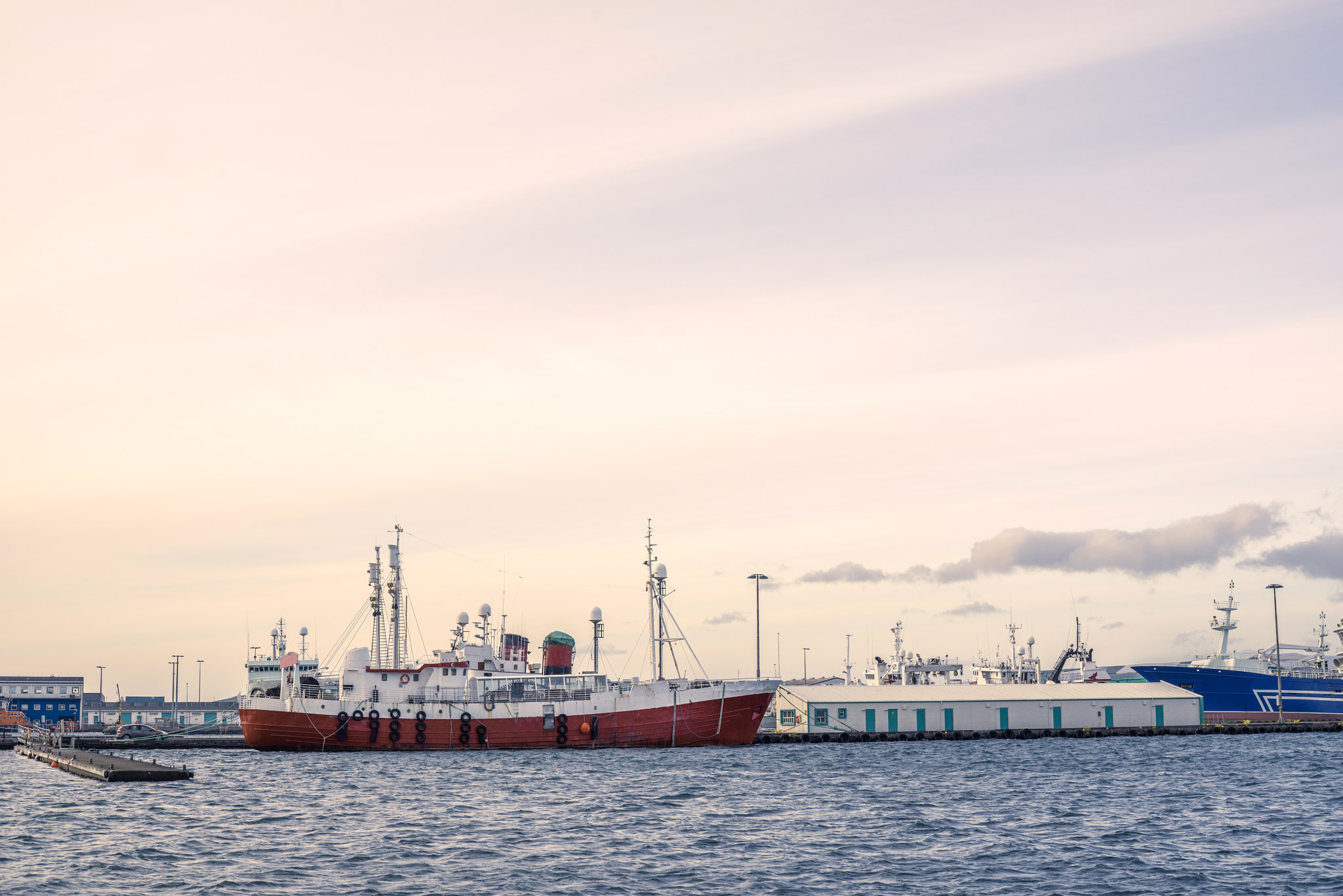 Sony a7R + Sony 50mm F1.4 sample photo. Ships by the docks photography