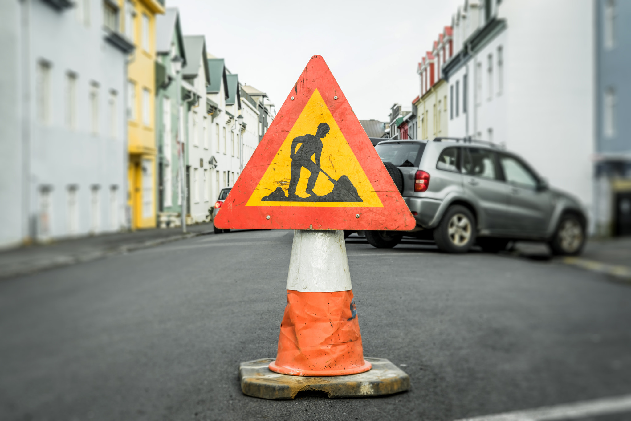 Sony a7R + Sony 50mm F1.4 sample photo. Roadwork sign on a cone photography