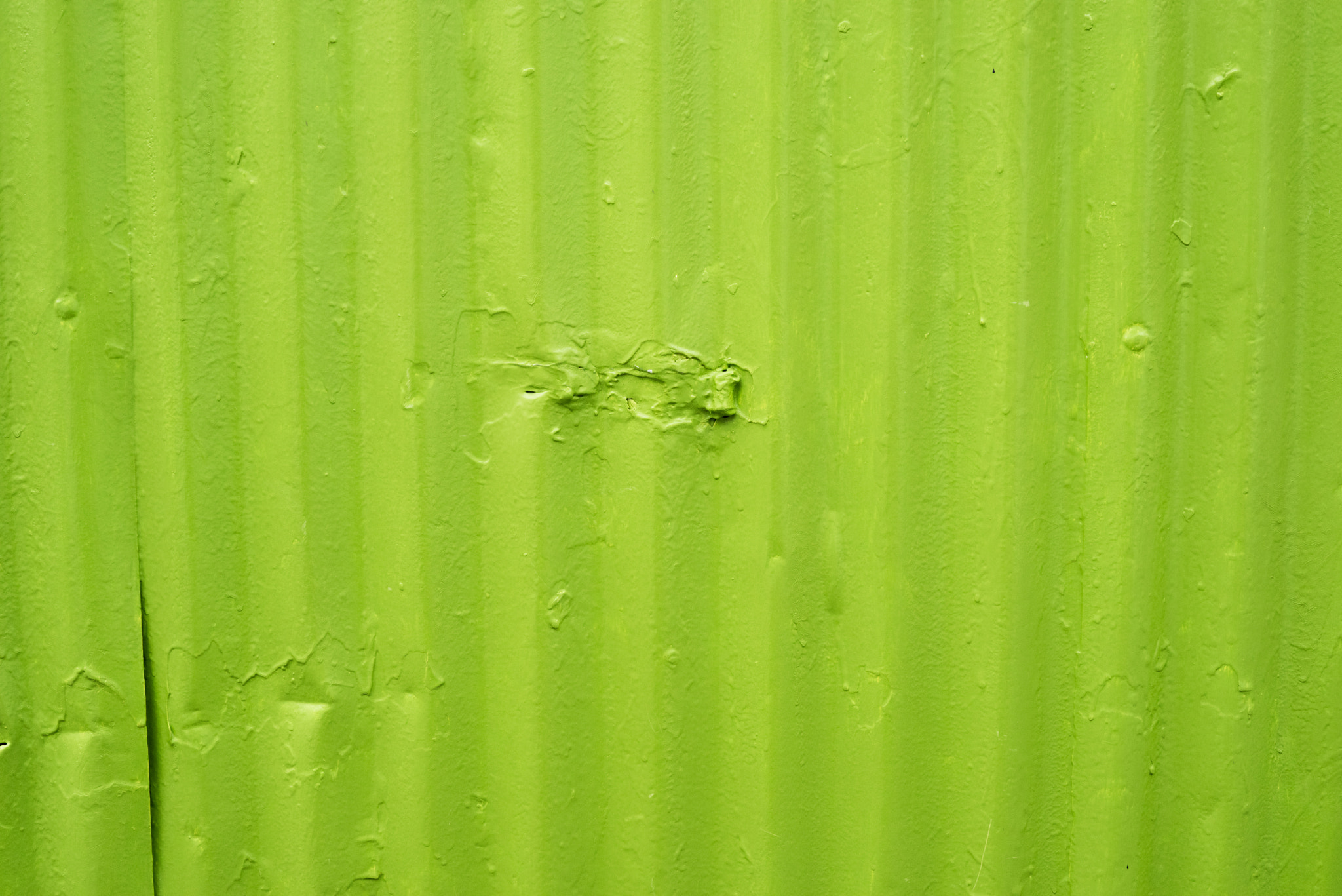 Sony a7R + Sony 50mm F1.4 sample photo. Green metal surface with worn paint photography