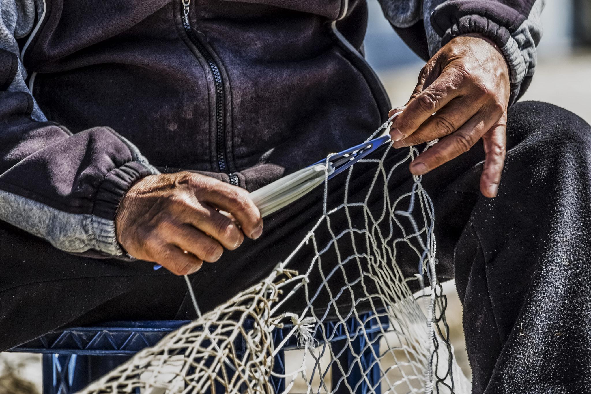 Canon EF 100-400mm F4.5-5.6L IS USM sample photo. The fisherman and the net photography