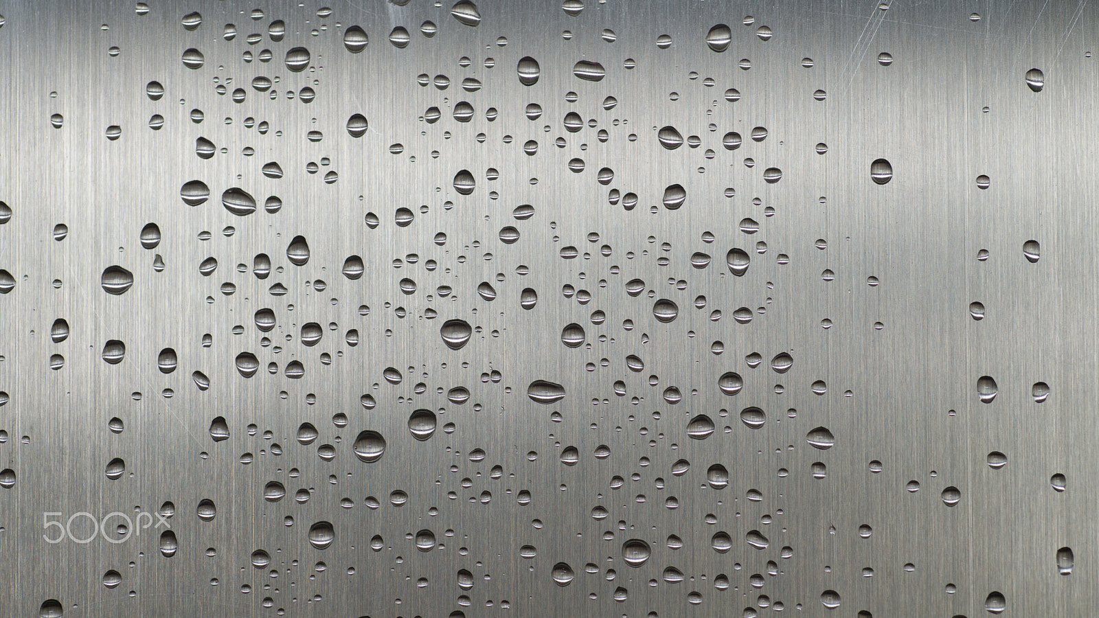 Tamron SP AF 90mm F2.8 Di Macro sample photo. Many small rain drops on grey steel photography