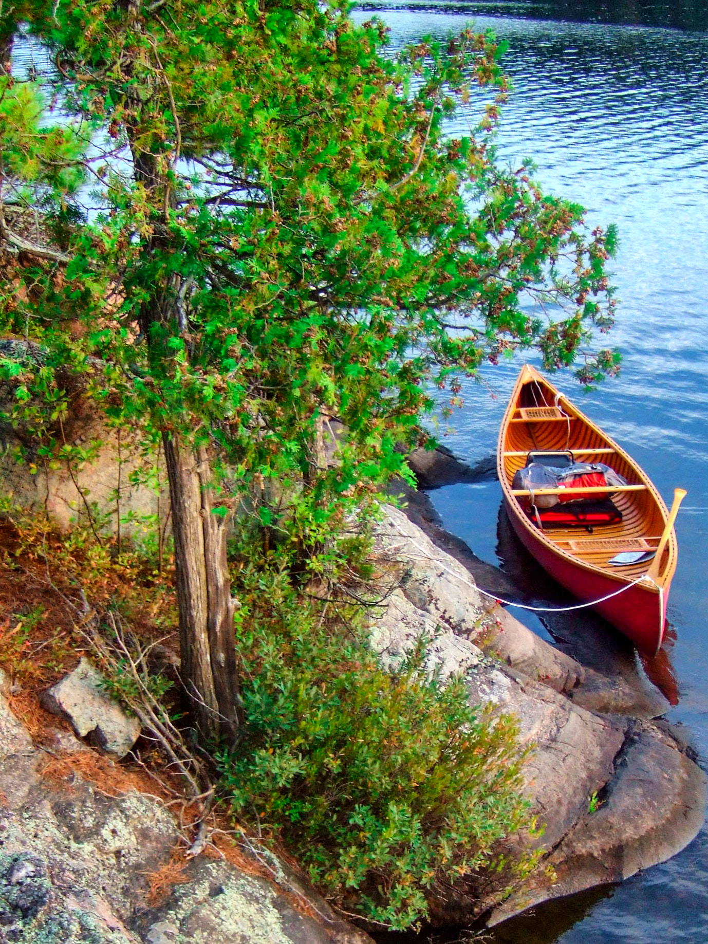 Fujifilm FinePix F10 sample photo. Canoe beckons photography