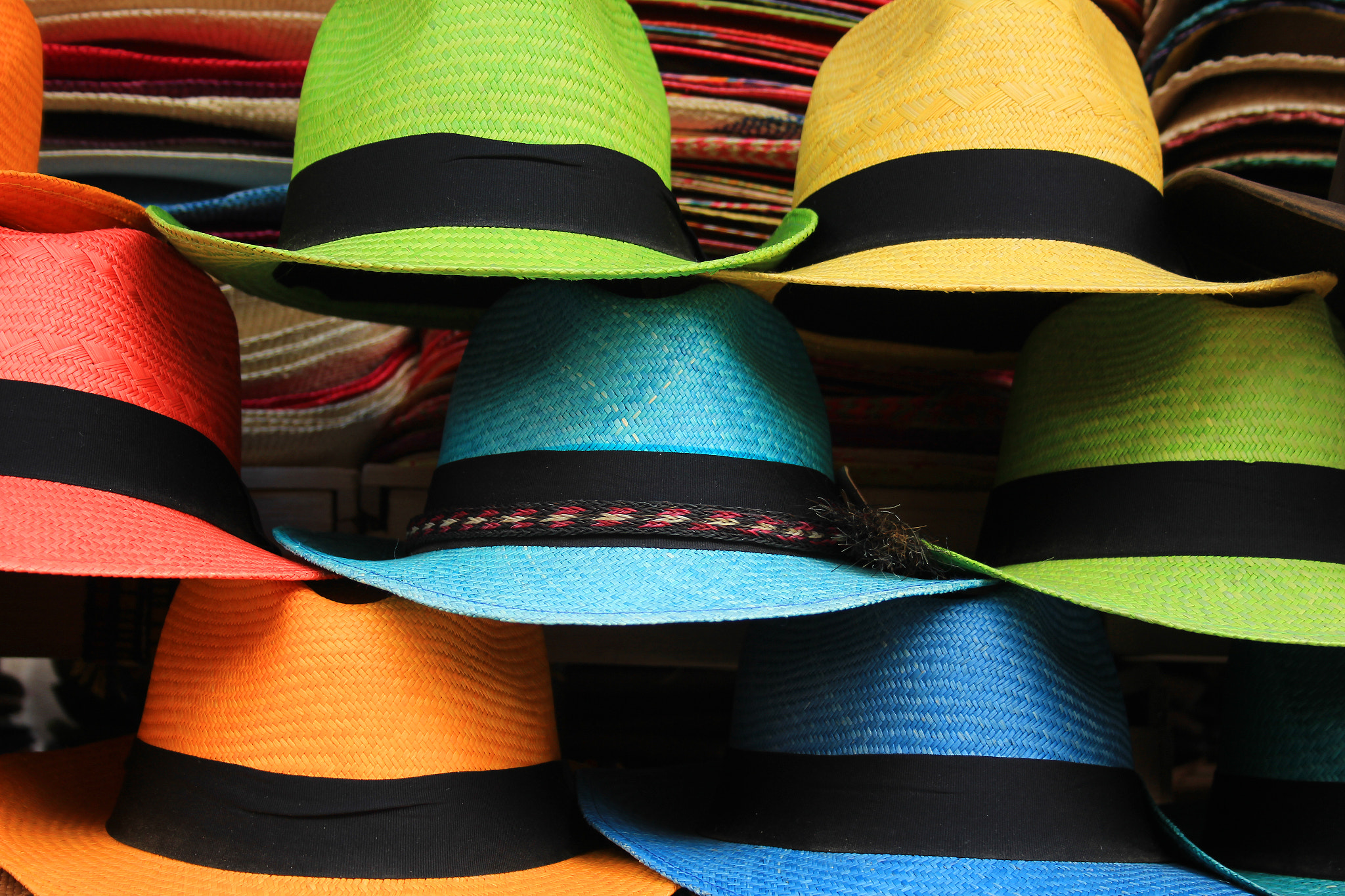 Canon EOS 600D (Rebel EOS T3i / EOS Kiss X5) + Canon EF-S 18-55mm F3.5-5.6 sample photo. Colorful handmade panama hats photography