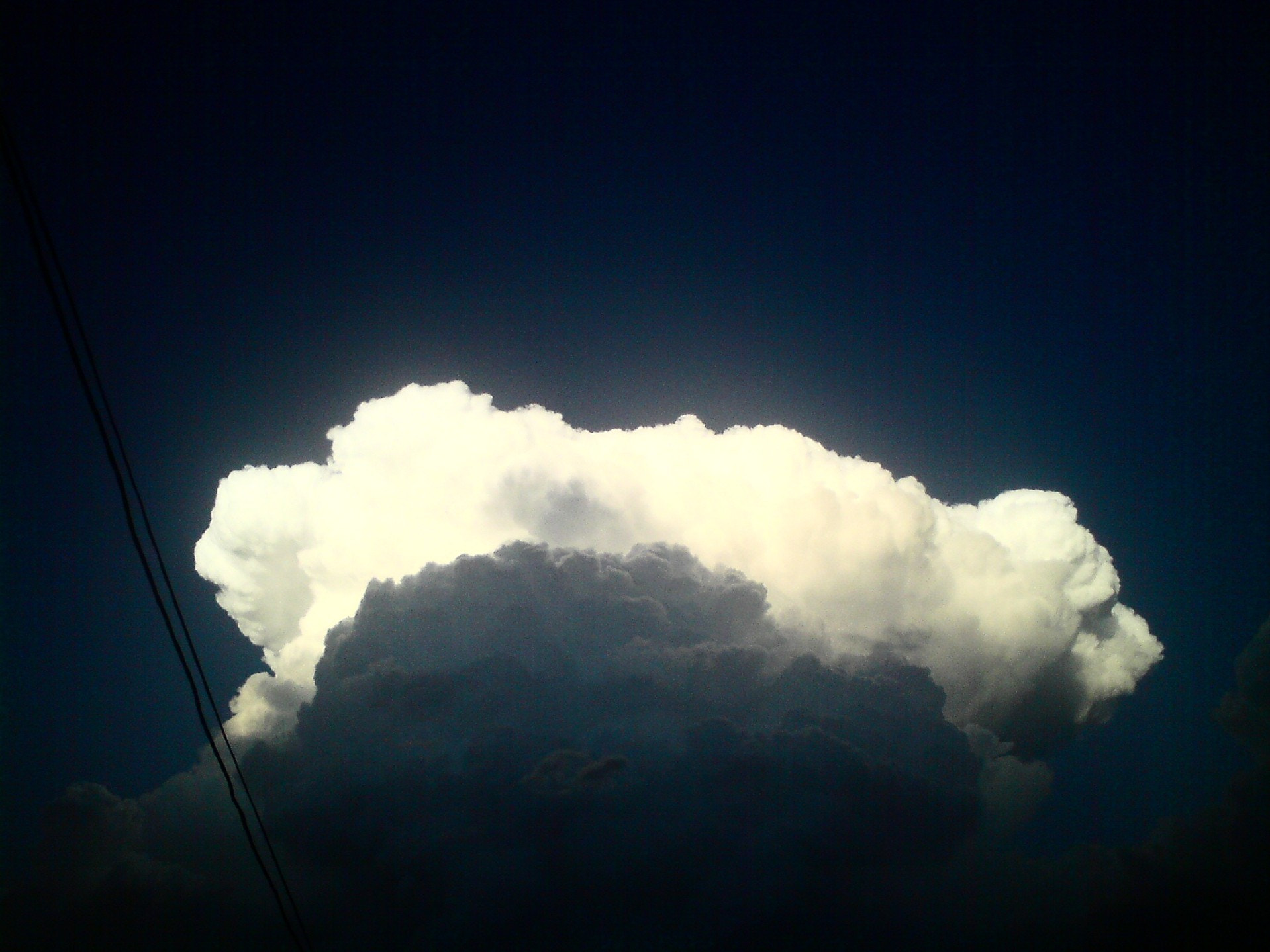Sony Ericsson C510 sample photo. Cloud faces in time photography