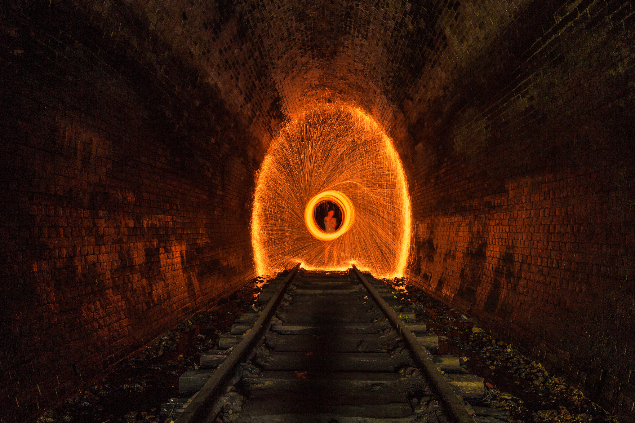 Canon EOS 700D (EOS Rebel T5i / EOS Kiss X7i) + Canon EF 16-35mm F4L IS USM sample photo. Steel wool light trails in old helensburgh tunnel photography
