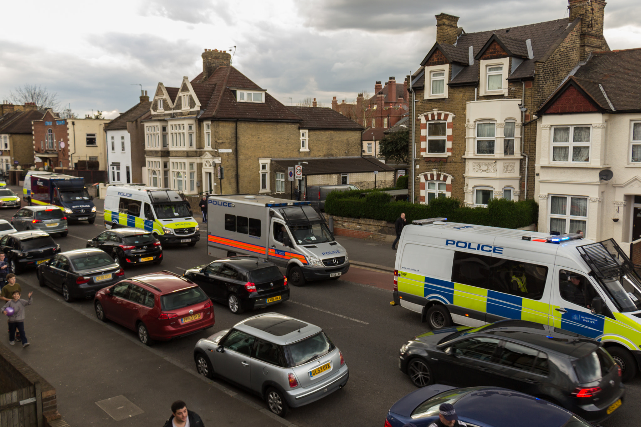 Canon EF-S 18-135mm F3.5-5.6 IS STM sample photo. Many police vehicles photography