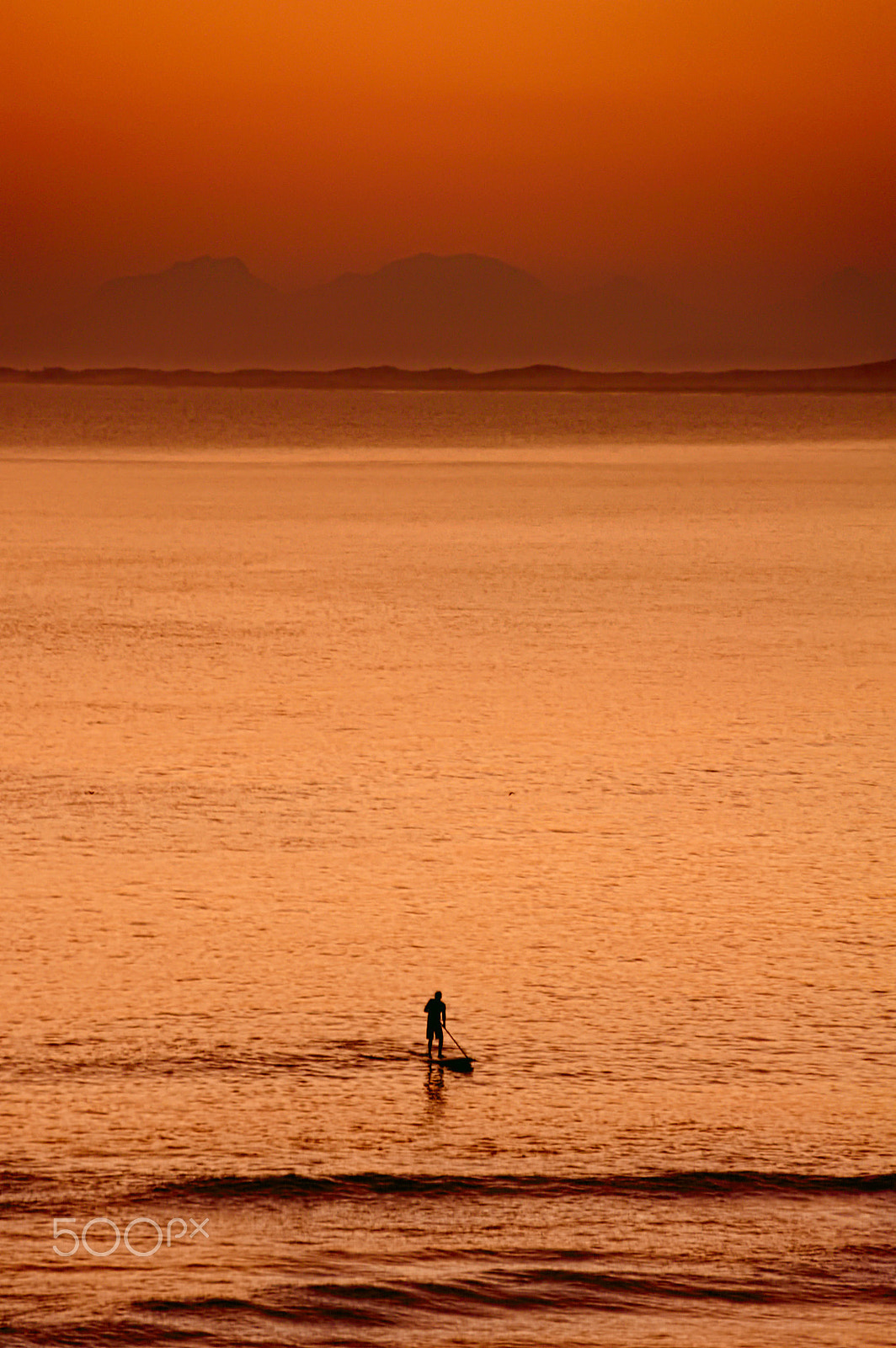 Sigma 18-250mm F3.5-6.3 DC Macro OS HSM sample photo. Man surfing in the sea photography