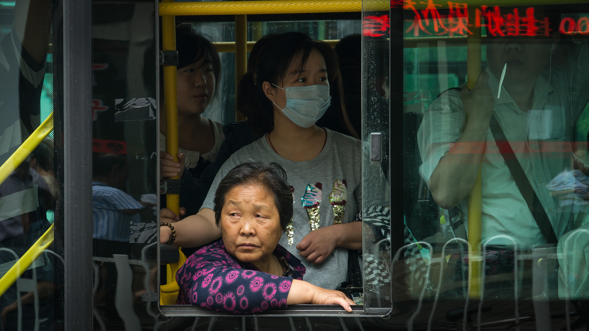Sony E 18-200mm F3.5-6.3 OSS sample photo. Riding the bus photography