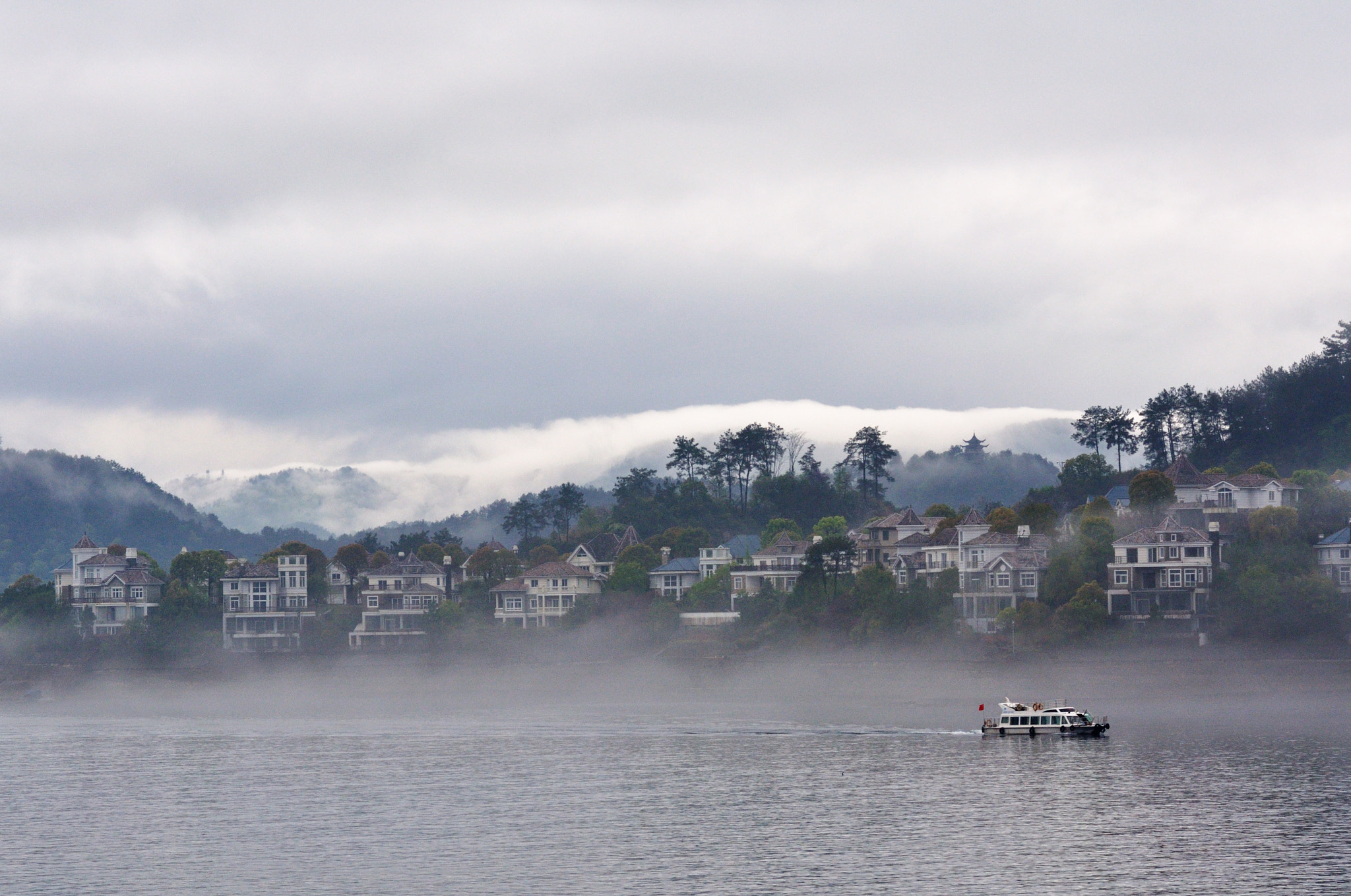 ZEISS Makro-Planar T* 100mm F2 sample photo. Villas in clouds and mist photography