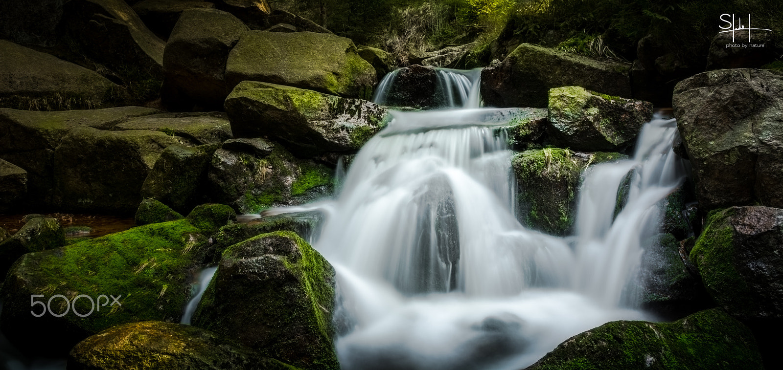 Sigma 18-50mm F2.8-4.5 DC OS HSM sample photo. Stone and water photography