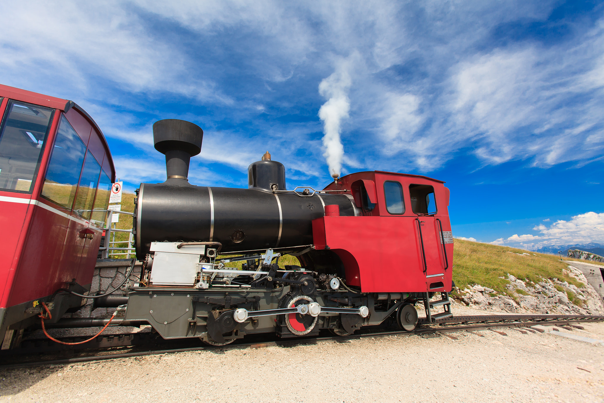Canon EF 16-35mm F2.8L USM sample photo. Steam train in a beautiful alpine landscape. photography
