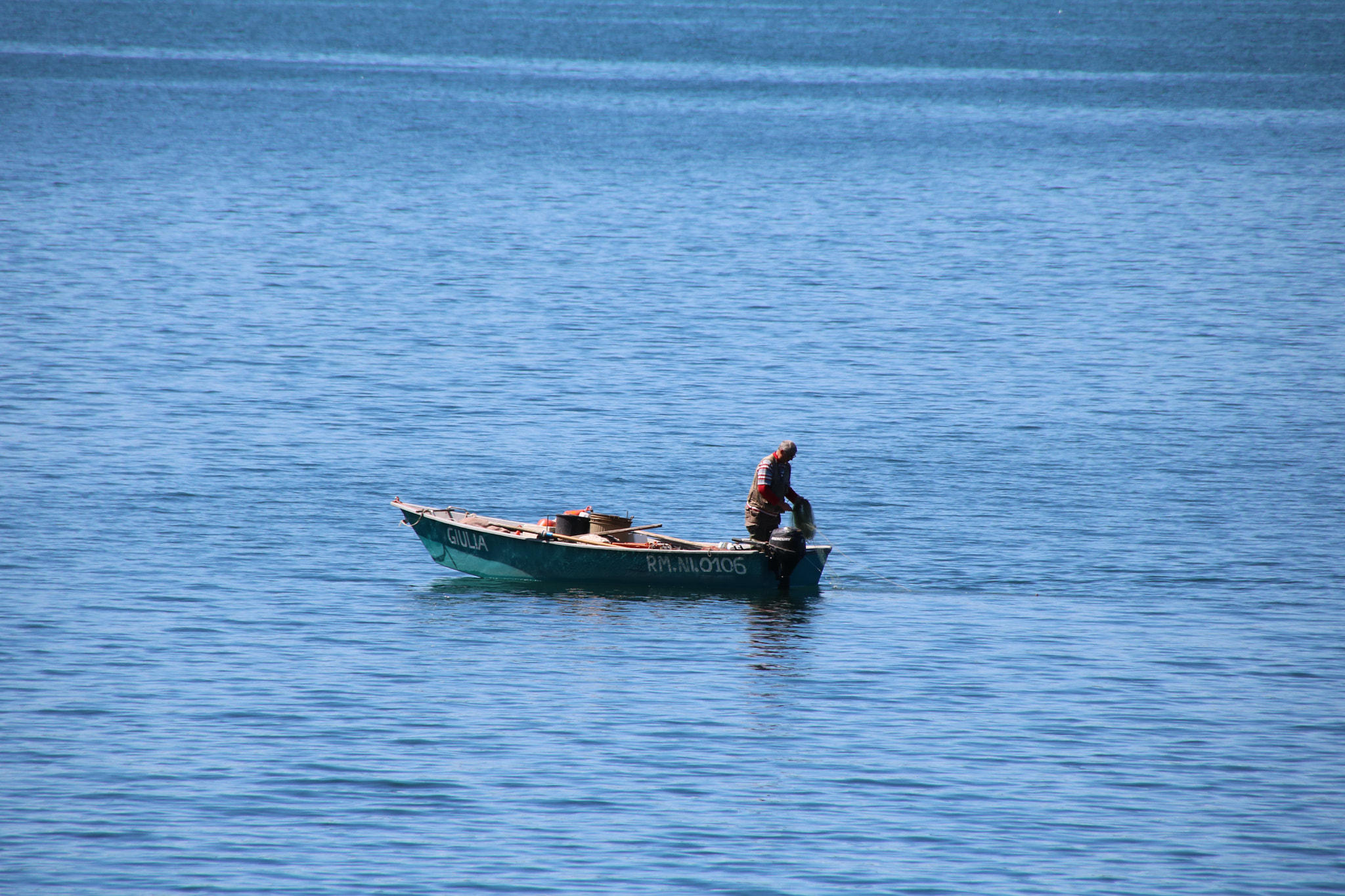 Canon EOS 760D (EOS Rebel T6s / EOS 8000D) sample photo. Pescatore solitario photography