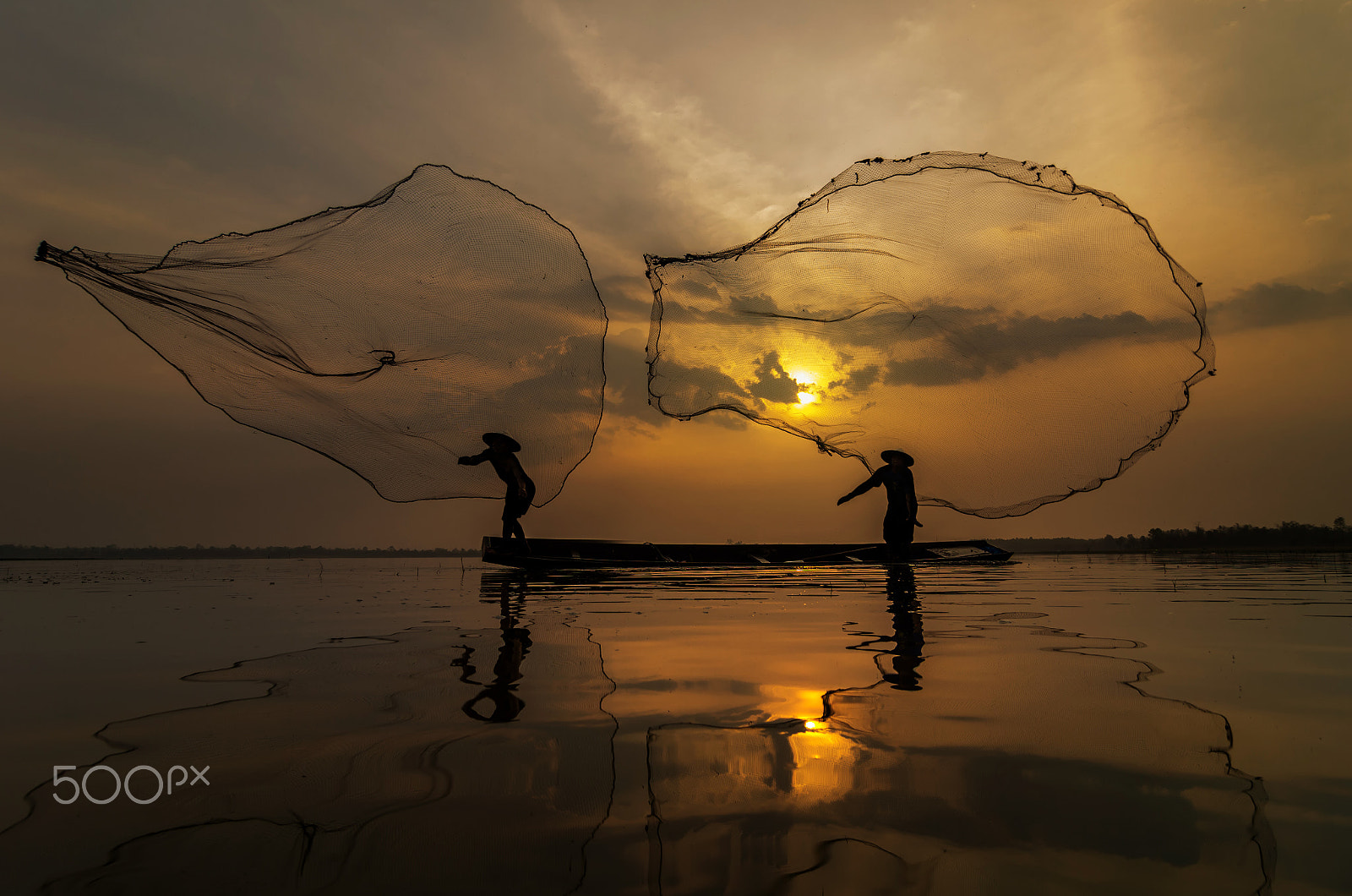 Pentax smc DA 12-24mm F4.0 ED AL (IF) sample photo. Silhouette of asia traditional fisherman in action when fishing photography