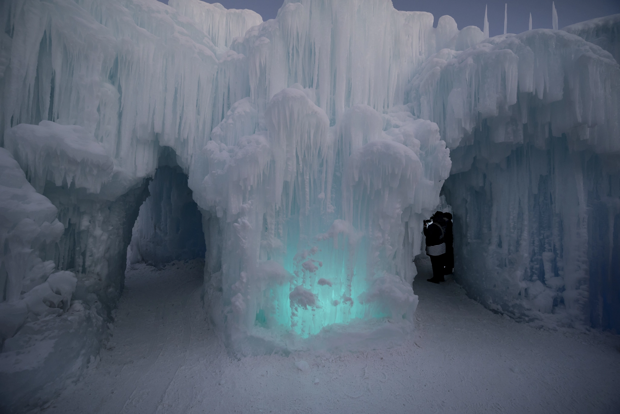 Sigma 12-24mm F4.5-5.6 EX DG Aspherical HSM sample photo. Illuminated icicle walls at night in ice castle in edmonton alberta photography