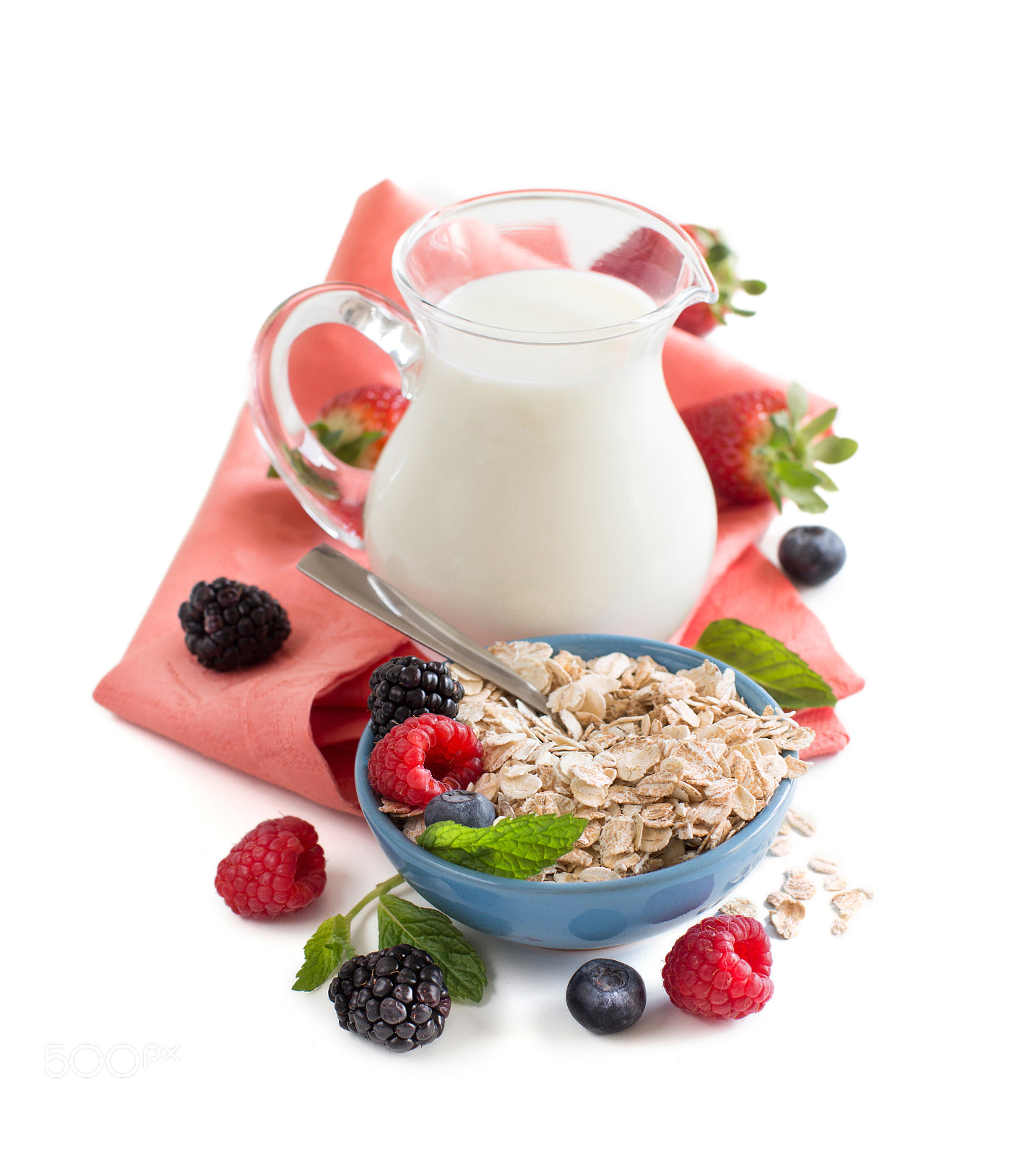 Canon EOS 650D (EOS Rebel T4i / EOS Kiss X6i) + Canon EF 50mm F1.2L USM sample photo. Rolled oats in a bowl with berries and milk photography