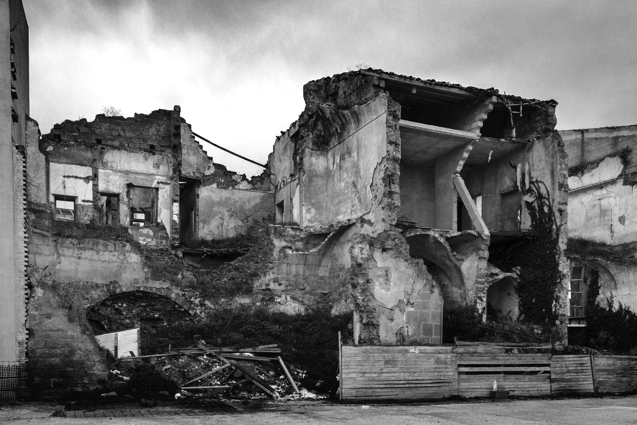 Canon EOS 400D (EOS Digital Rebel XTi / EOS Kiss Digital X) + Canon EF 17-40mm F4L USM sample photo. Village house destroyed by the earthquake photography