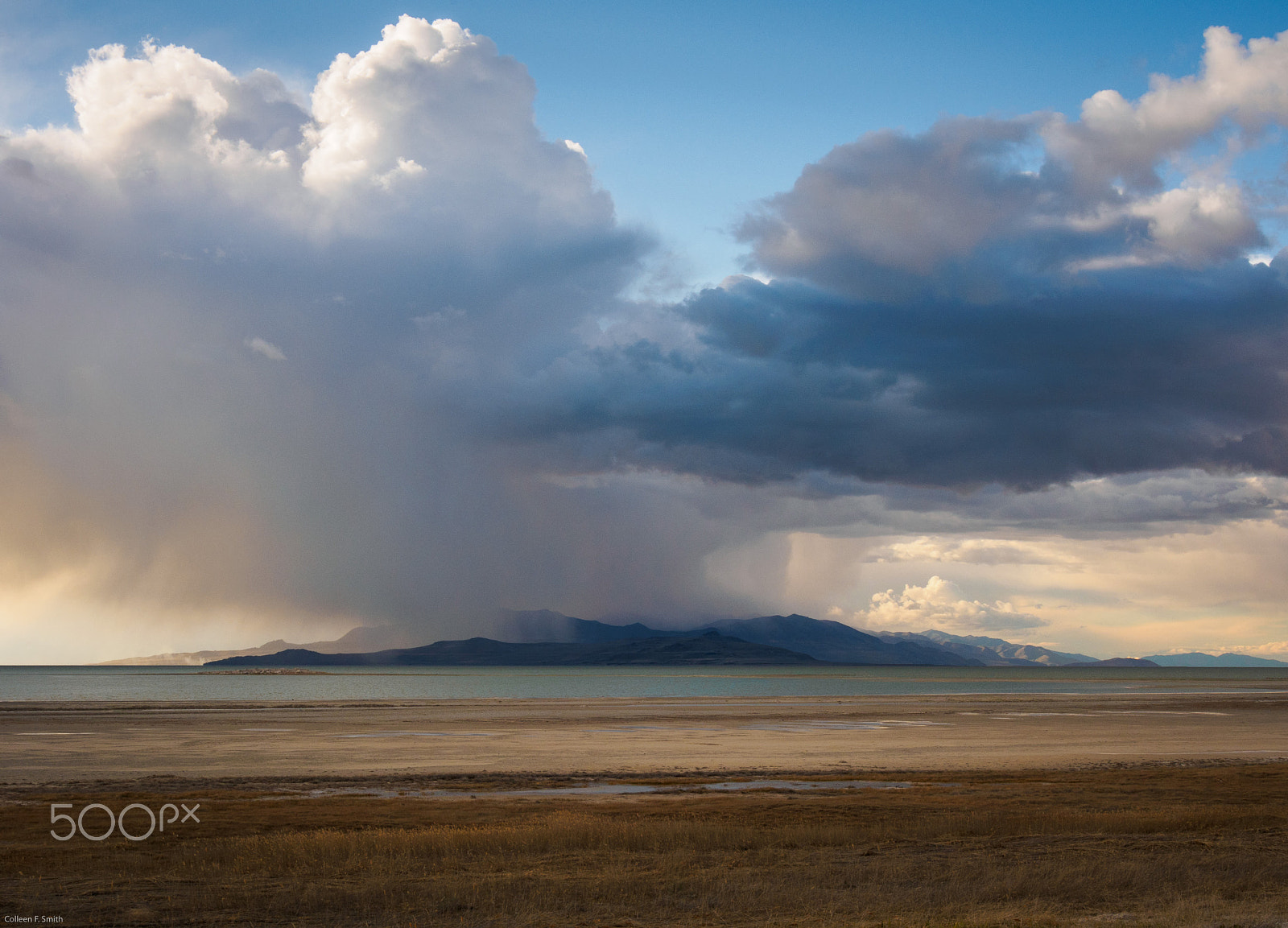OLYMPUS M.14-150mm F4.0-5.6 II sample photo. Storm clouds over fremont island photography