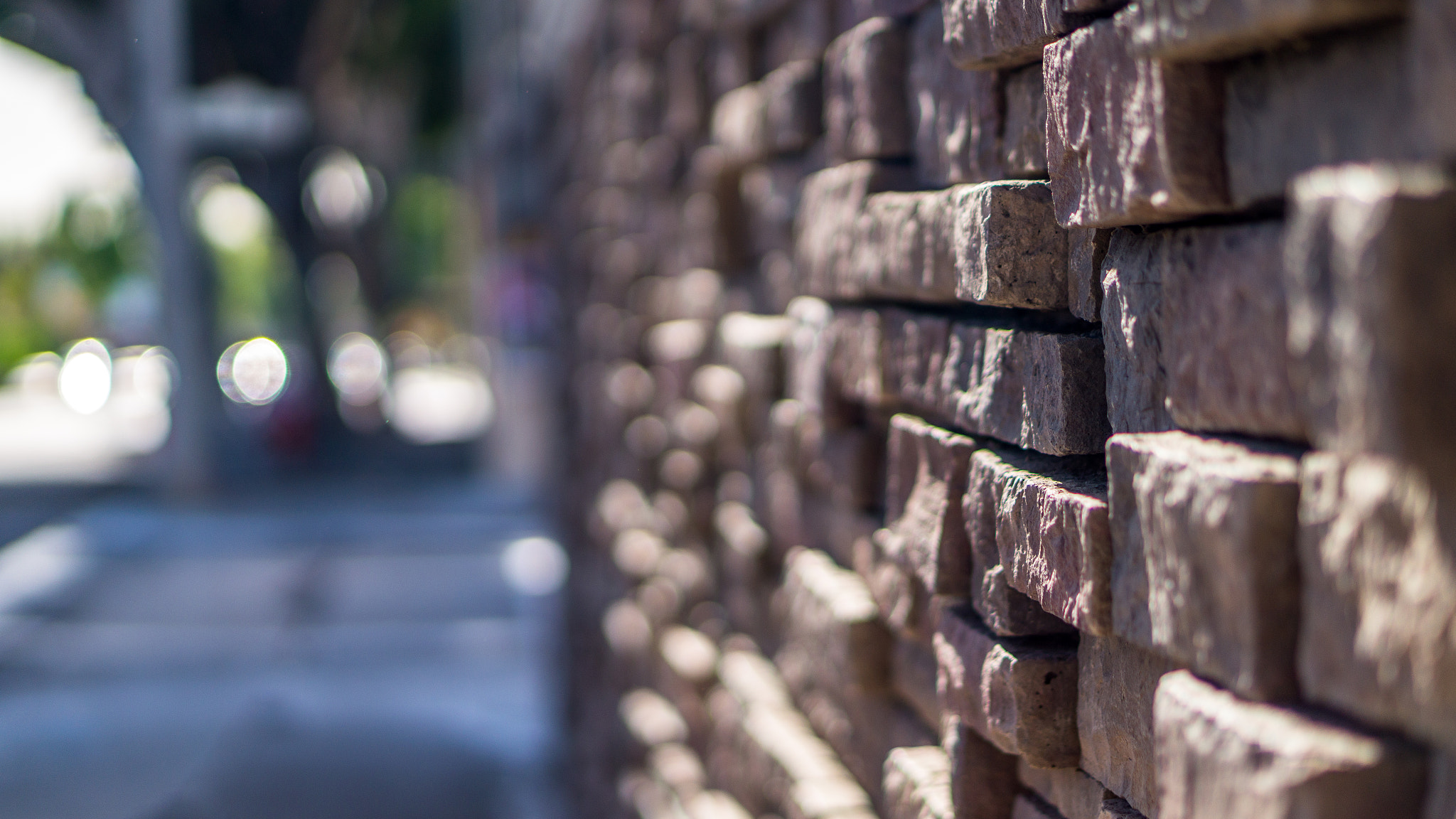 Sony Alpha a5000 (ILCE 5000) + E 50mm F1.8 OSS sample photo. Brick wall with bokeh photography