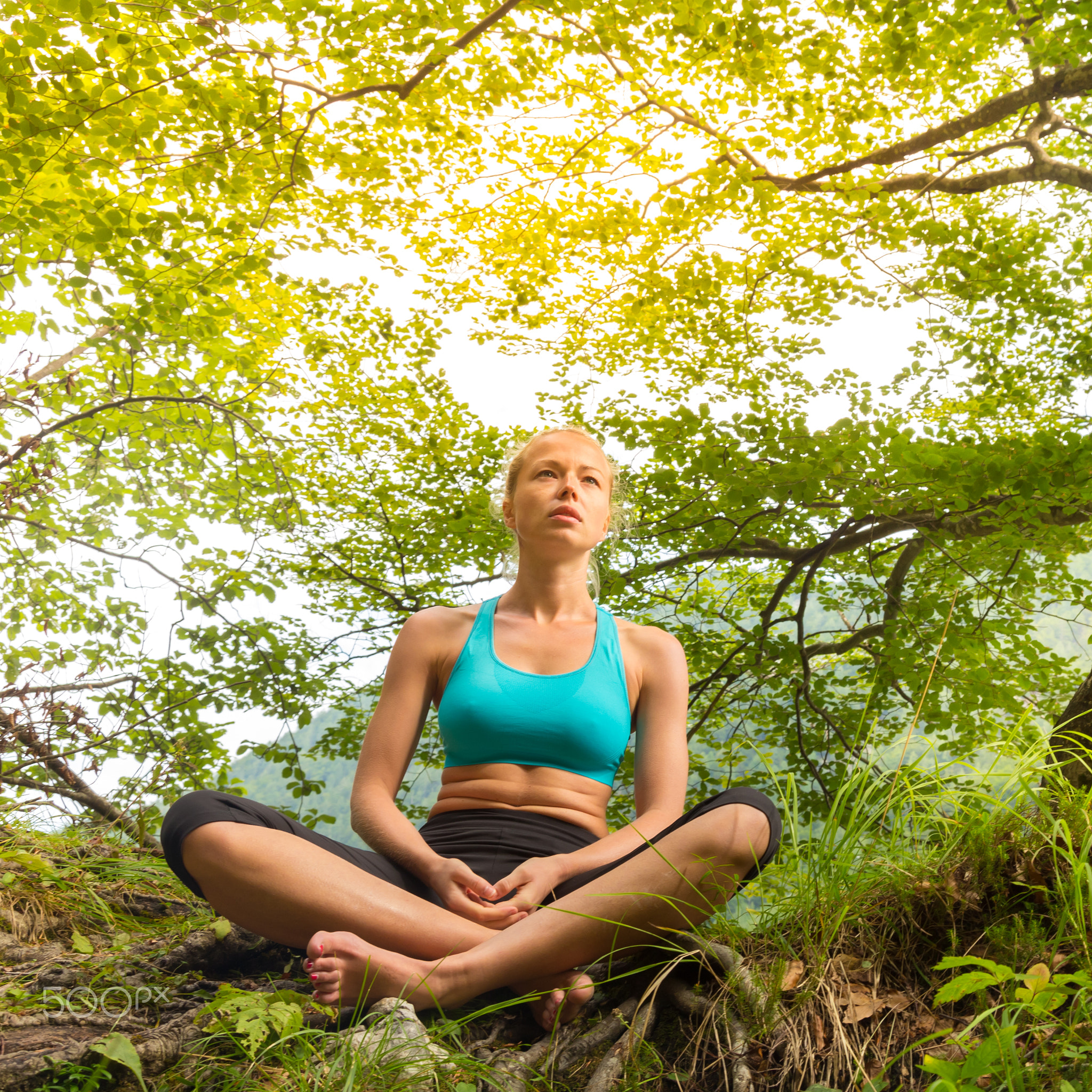 Woman relaxing in beautiful nature.