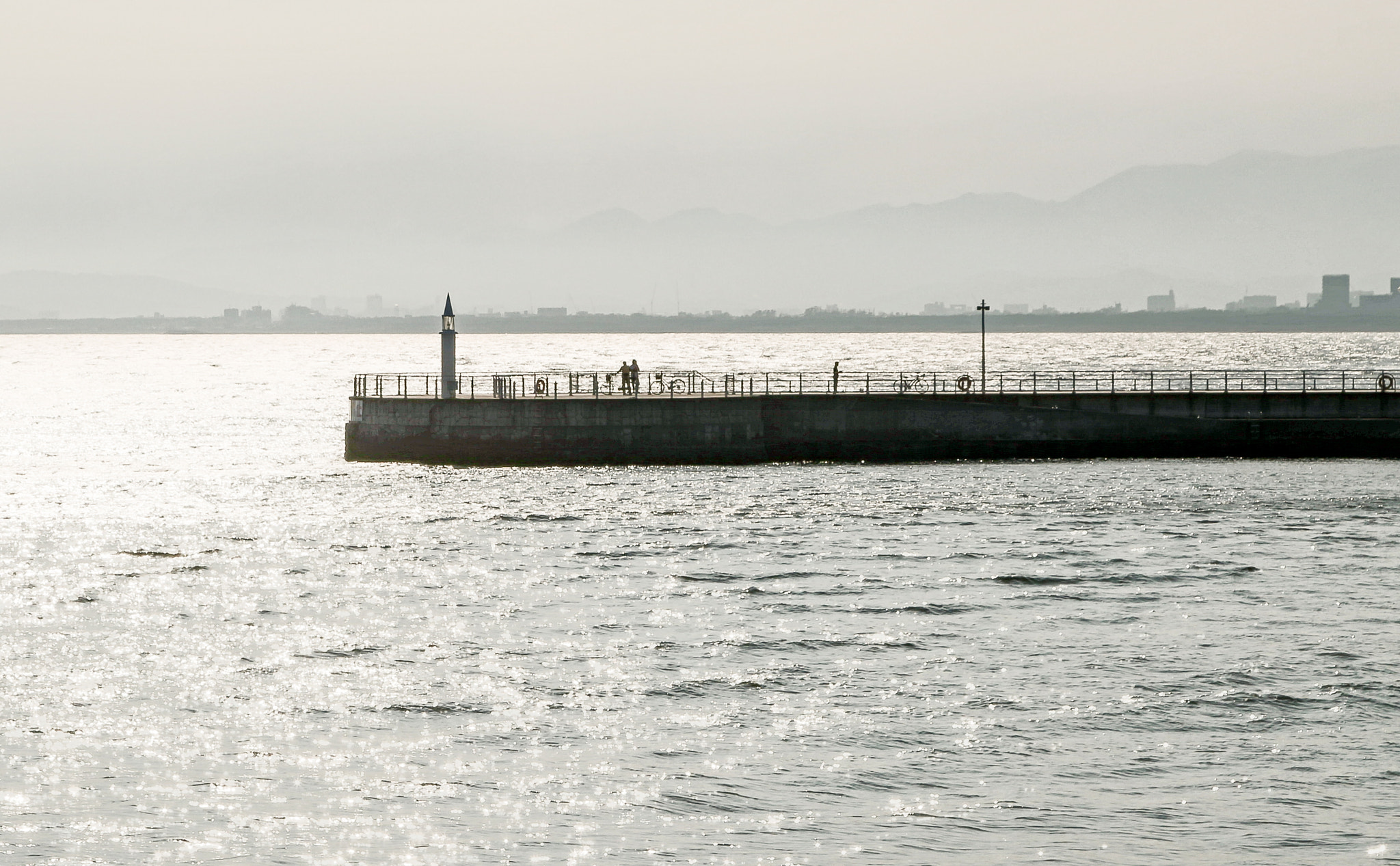 Canon EOS 100D (EOS Rebel SL1 / EOS Kiss X7) + Canon EF 24-105mm F4L IS USM sample photo. Sunset , lighthouse , people ~ photography