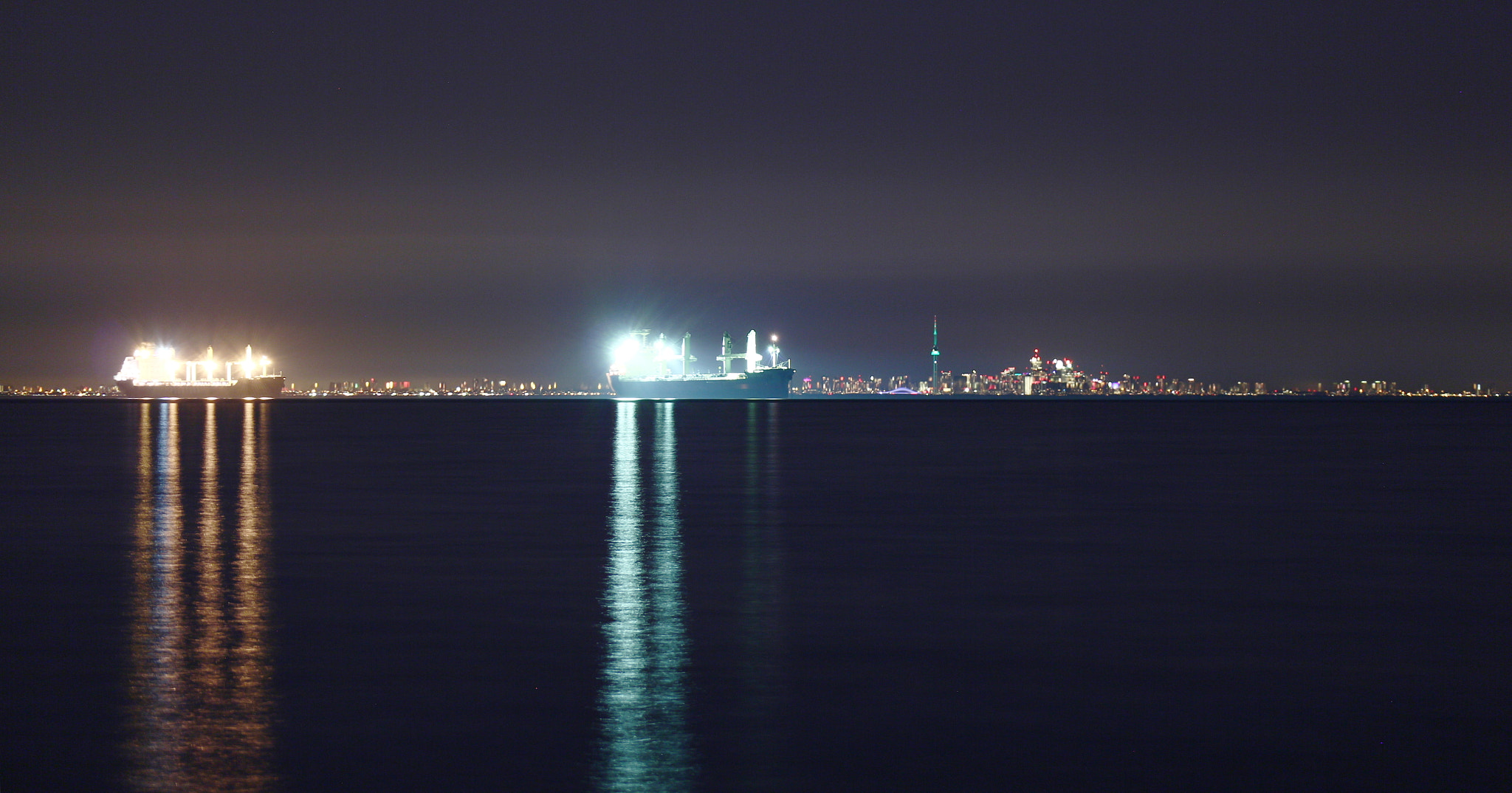Canon EOS M sample photo. Cargo ships at night on lake ontario photography