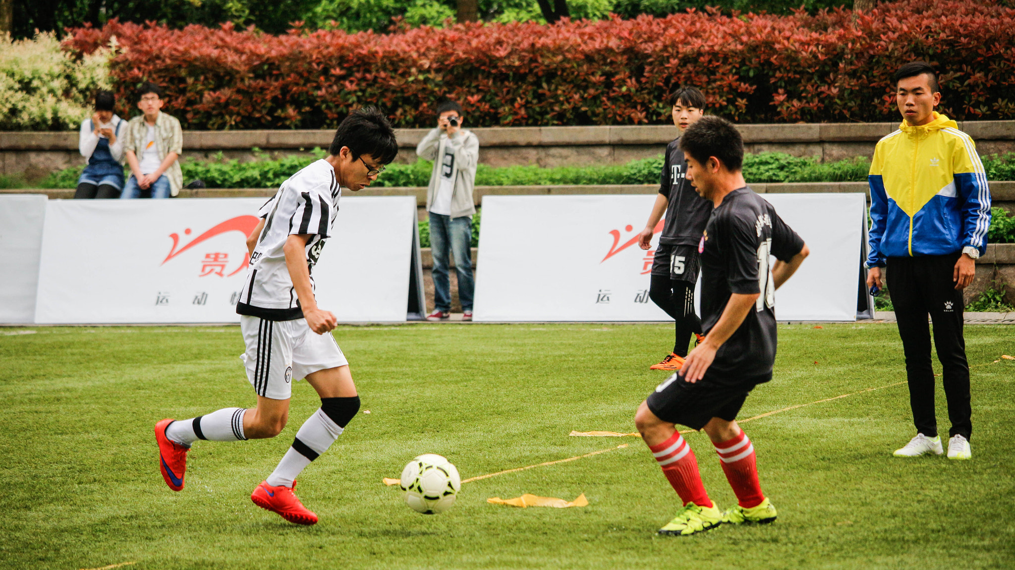 Canon EOS M + Canon EF-S 55-250mm F4-5.6 IS STM sample photo. Football photography