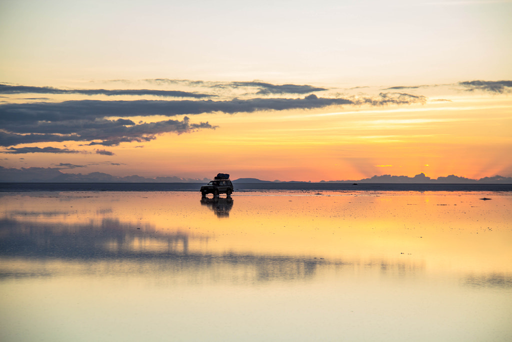 Sunrise driving at Salar de Uyuni by Bastien Poux on 500px.com