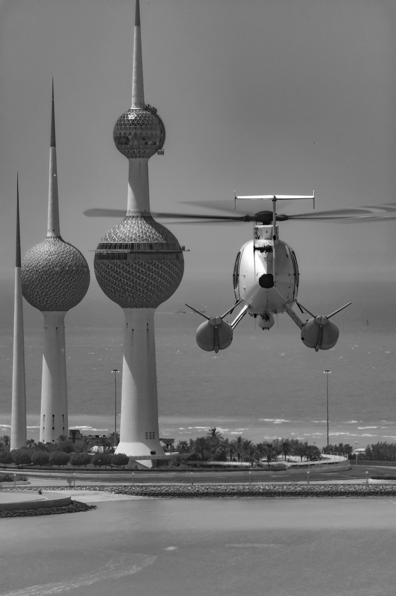 Nikon D2X + Nikon AF-S Nikkor 70-200mm F2.8G ED VR sample photo. Helicopter and kuwait towers photography