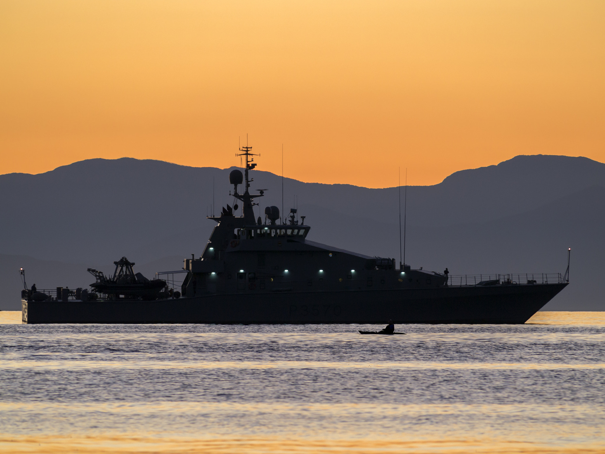Panasonic Lumix DMC-GX1 sample photo. Rnzn patrol boat off plimmerton photography