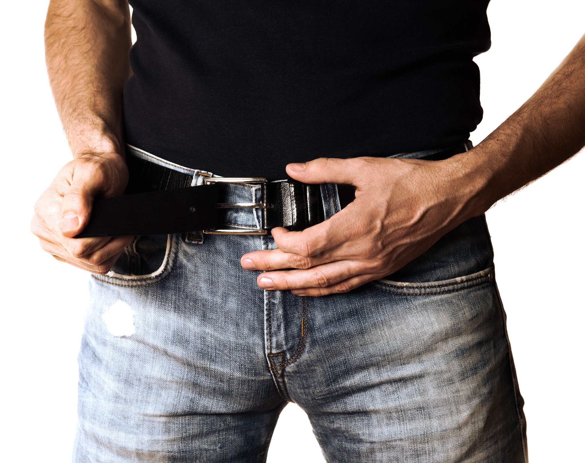 Cropped image of a man in jeans on white background