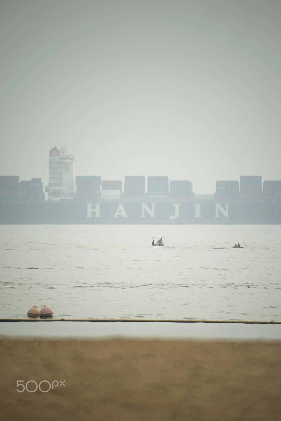 Sony a99 II + Sony 500mm F8 Reflex sample photo. Cargo ship at repulse bay, hong kong photography