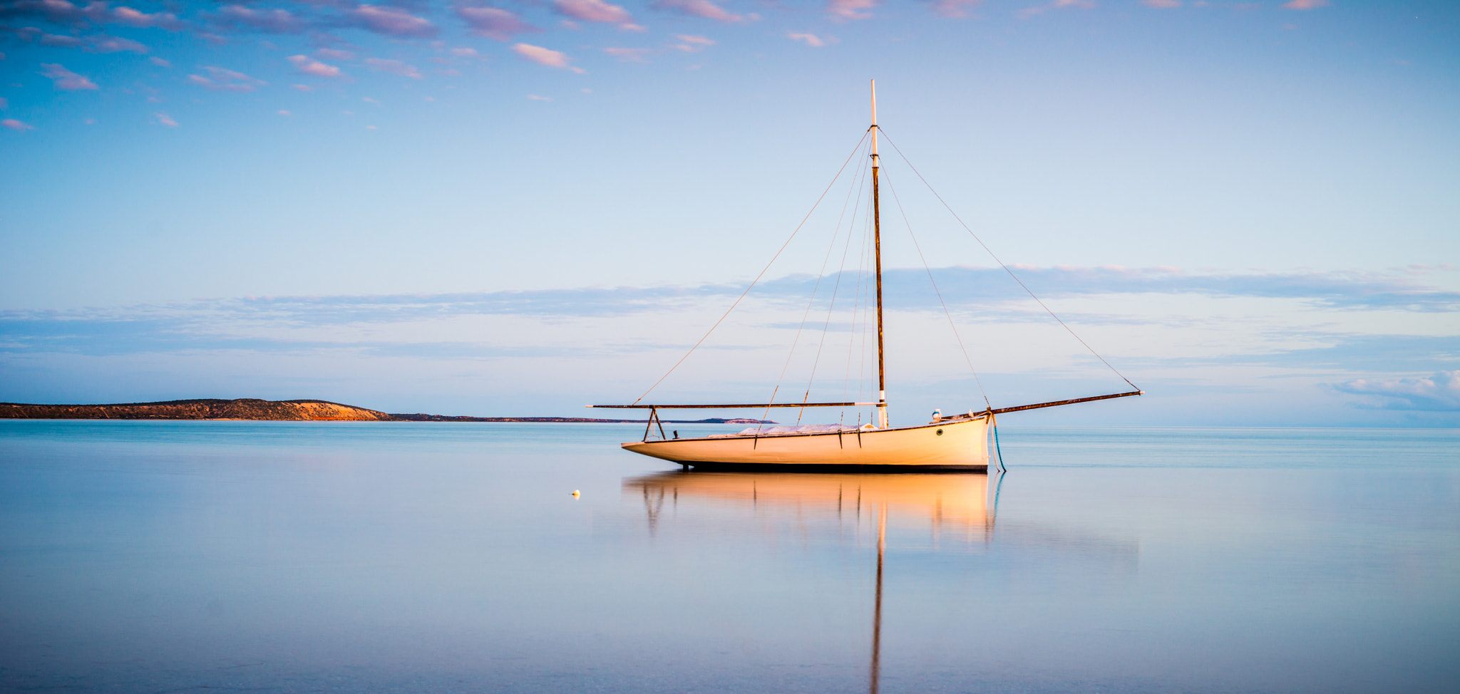 Nikon D800E + AF Nikkor 50mm f/1.8 sample photo. Classic sailboat at sunset photography