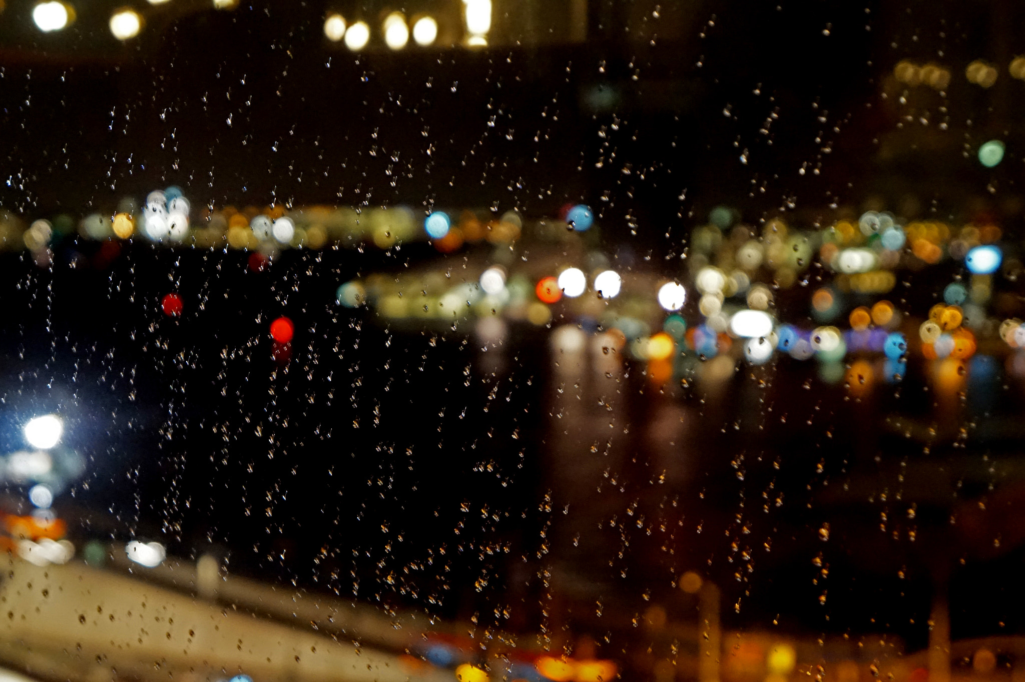 Sony Alpha a5000 (ILCE 5000) + Sony E 18-55mm F3.5-5.6 OSS sample photo. The rain photography