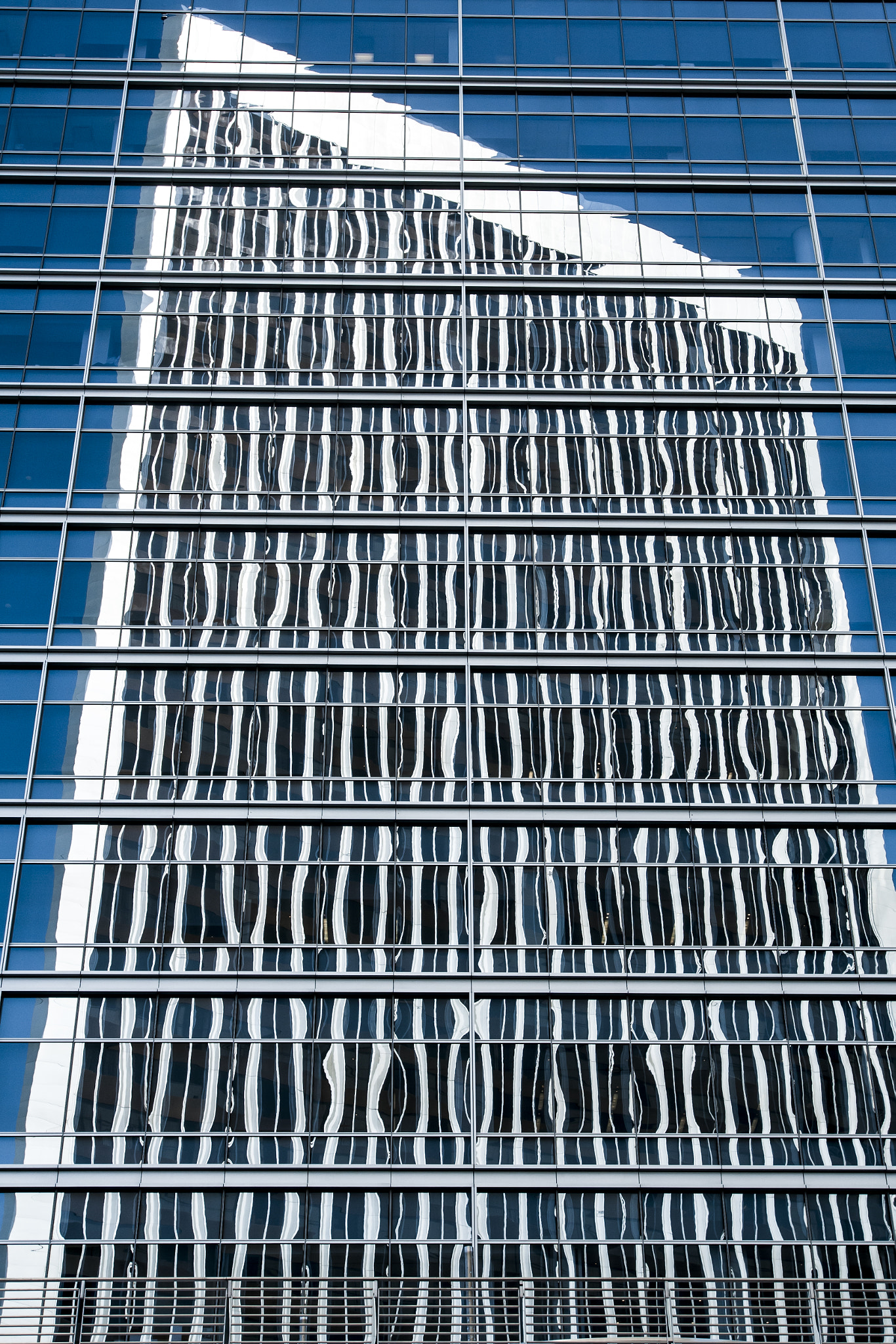 Nikon AF-S Nikkor 17-35mm F2.8D ED-IF sample photo. Office building reflection photography