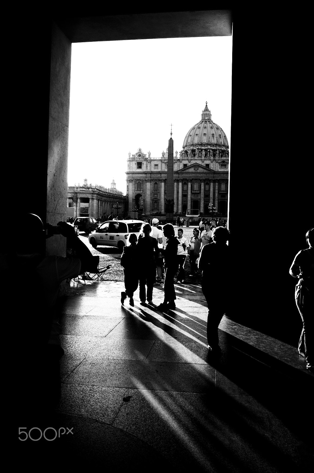 Sigma 20-40mm F2.8 sample photo. The silhouettes of people doing the work of the fi photography