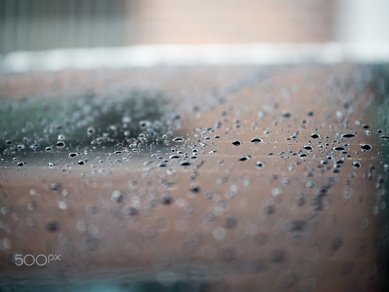 Panasonic Lumix G X Vario 35-100mm F2.8 OIS sample photo. Rain photography