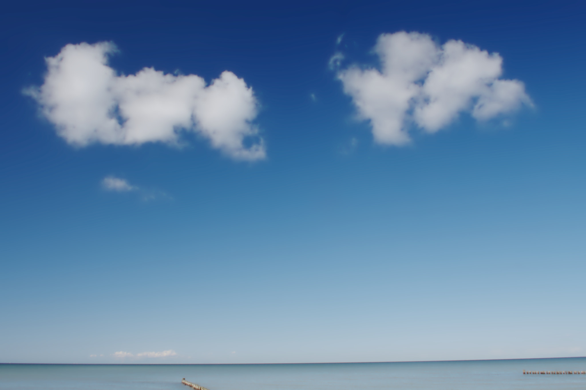 Sigma 18-50mm F2.8-4.5 DC OS HSM sample photo. Clouds at the baltic sea photography