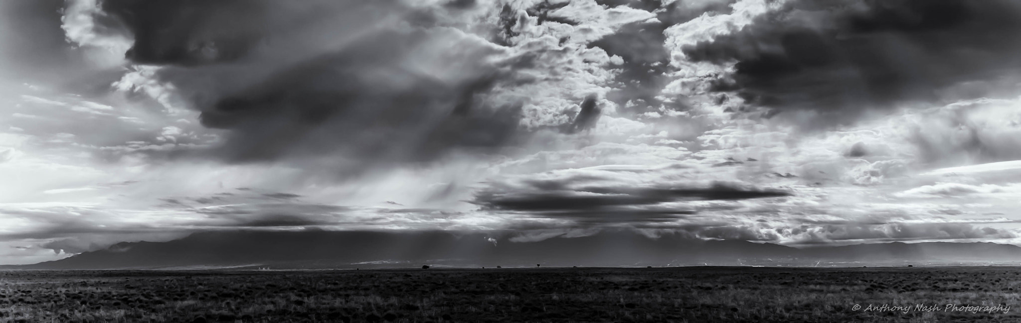 AF Zoom-Nikkor 35-70mm f/2.8D sample photo. Phoenix over the sandias photography
