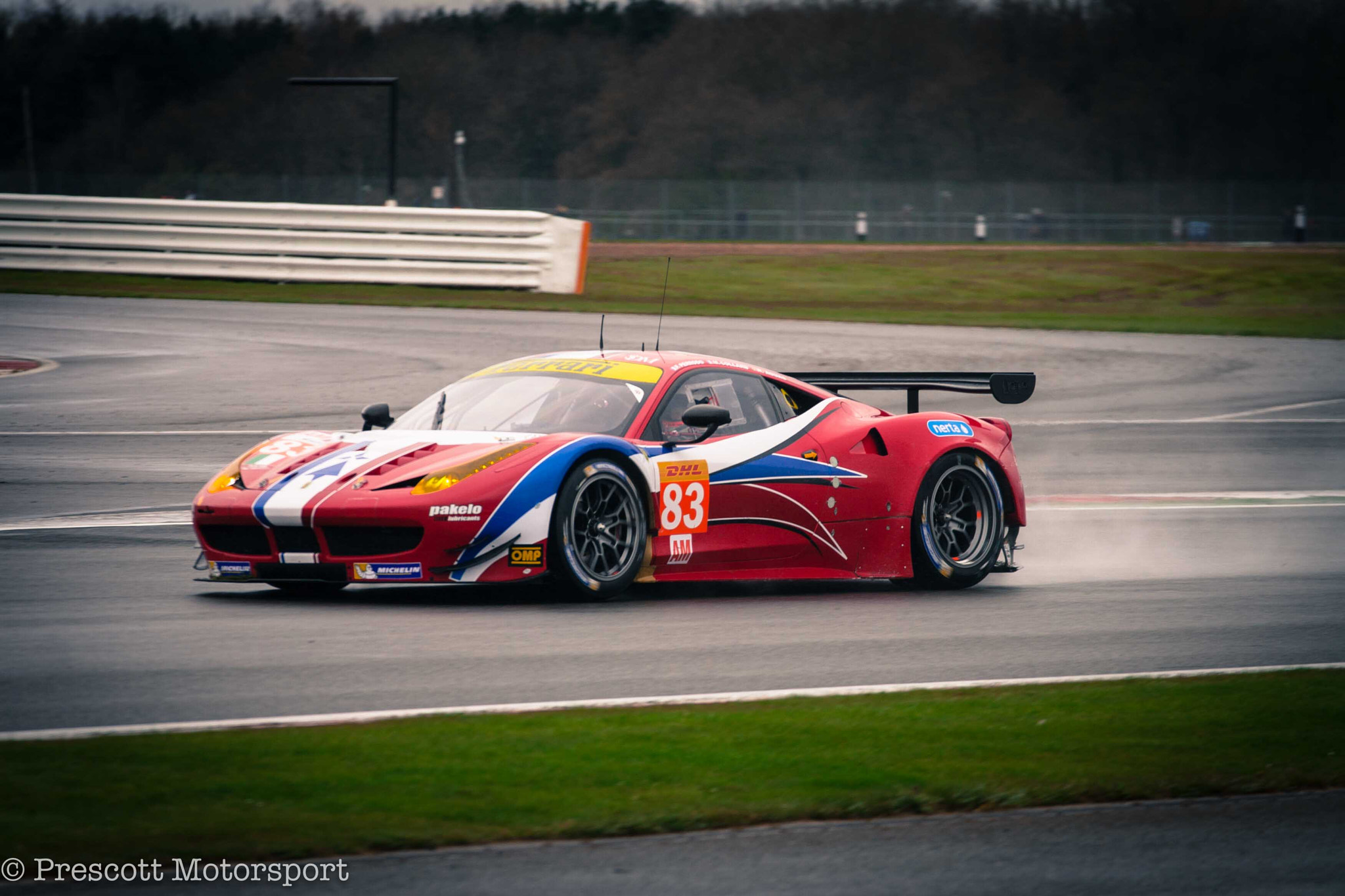 Canon EOS 30D + Canon EF 70-200mm F4L USM sample photo. Ferrari in the rain photography