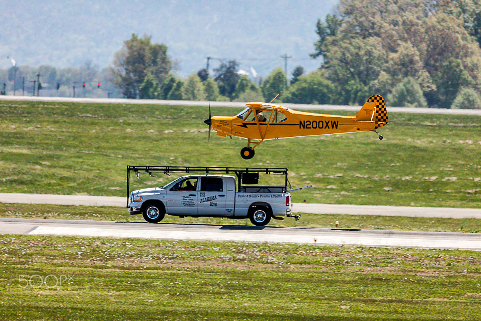 Canon EOS 5DS + Sigma 150-600mm F5-6.3 DG OS HSM | C sample photo. Greg koontz airshows landing on pickup photography