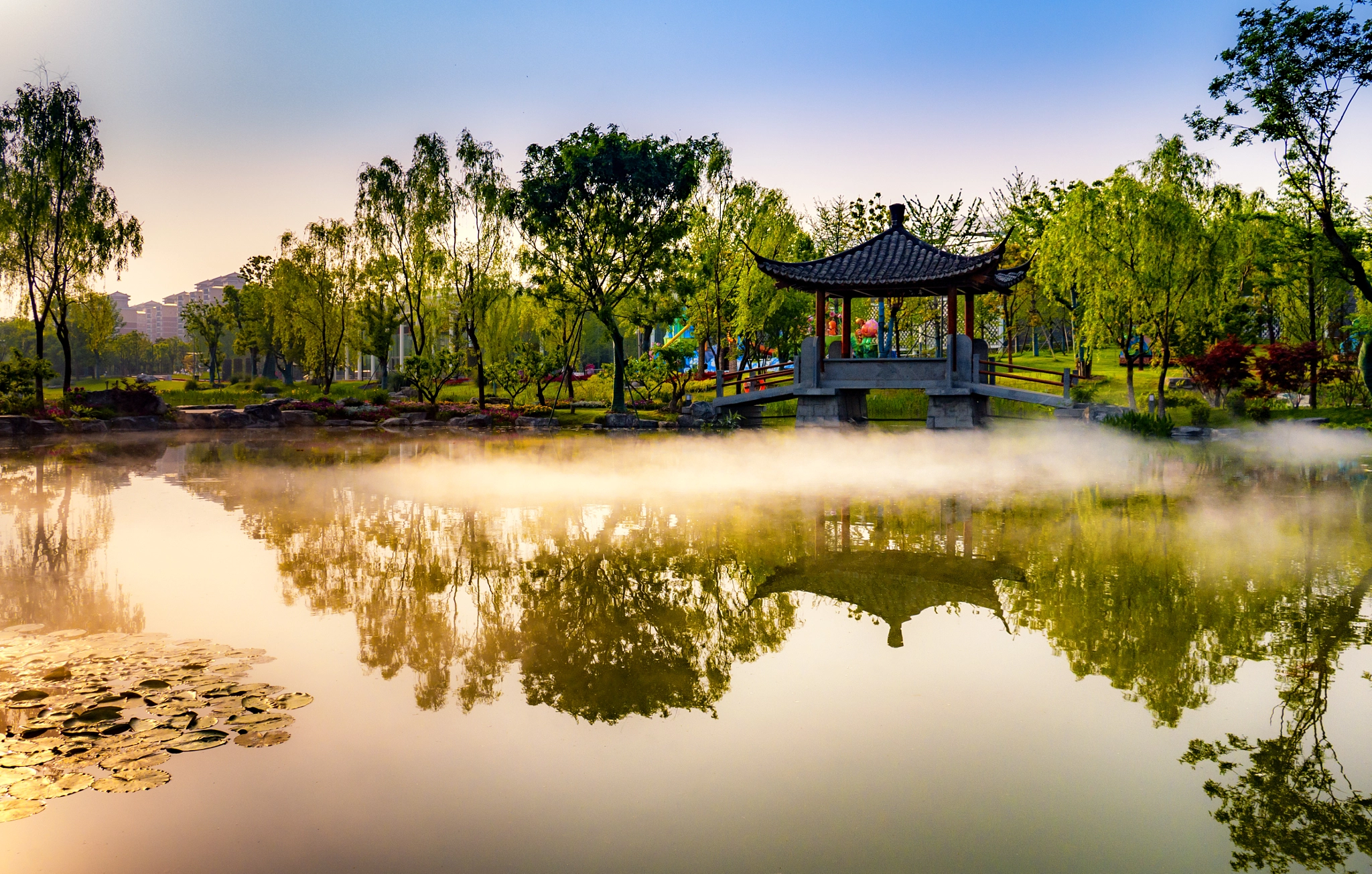LUMIX G VARIO PZ 14-42/F3.5-5.6 sample photo. Pavilion on misty pond photography