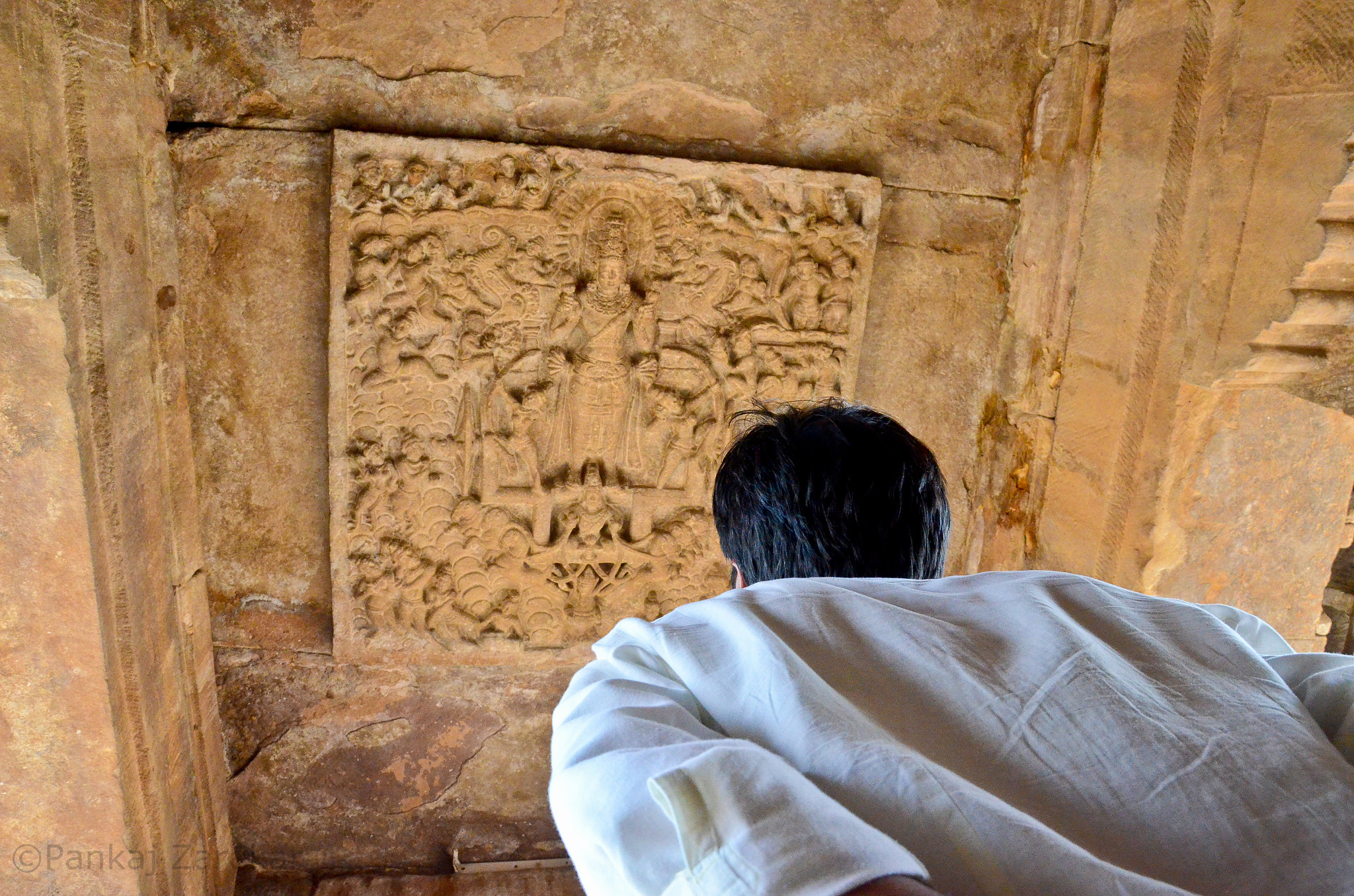 FSA-L2, EDG 65, 800mm F13 G sample photo. Man observing the carving in the ancient temple photography