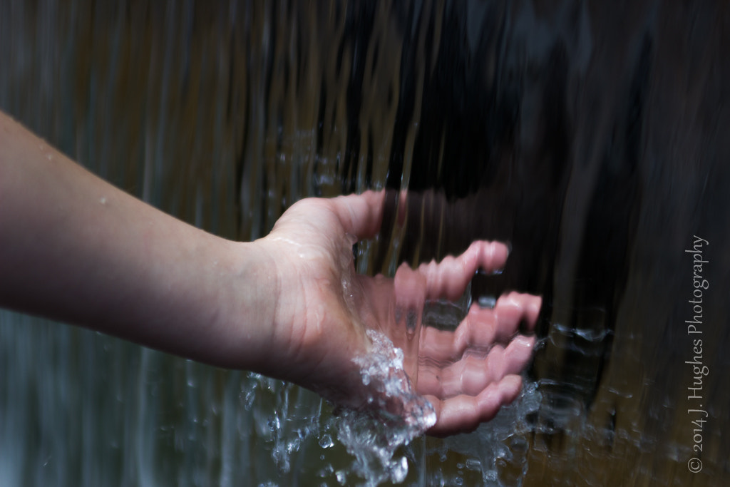 Canon EF 28-70mm f/3.5-4.5 sample photo. Hand in water photography