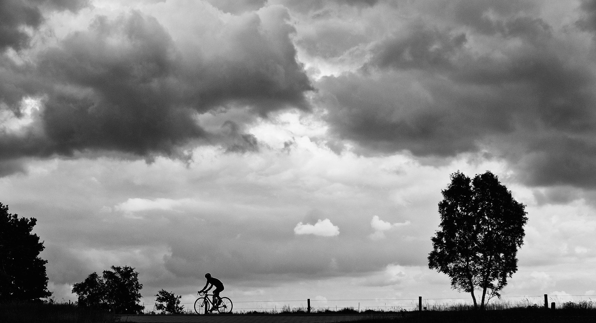 Sony Alpha DSLR-A580 sample photo. The lonely bicyclist photography