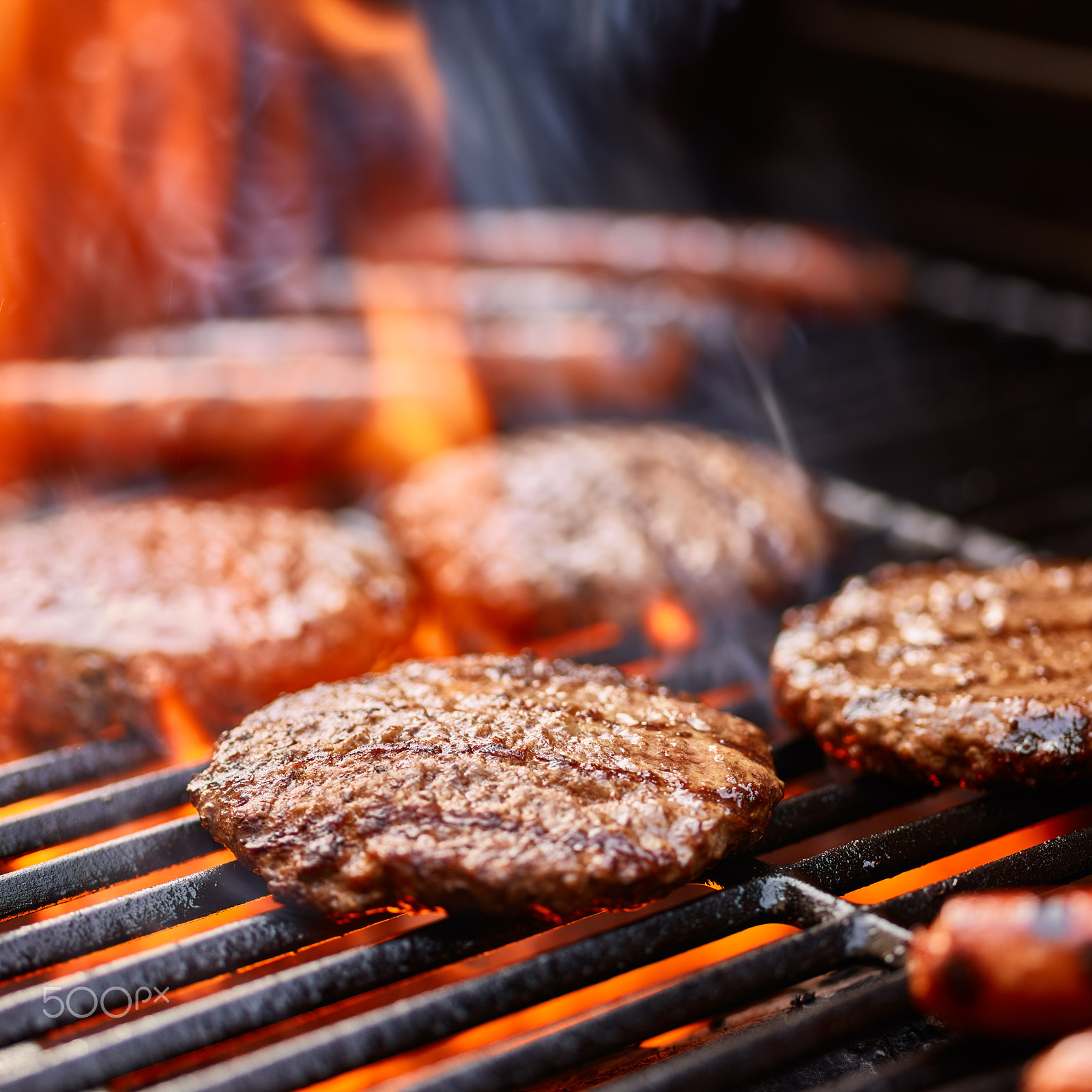 Phase One P65+ sample photo. Flame broiled hamburger patties cooking on grill photography
