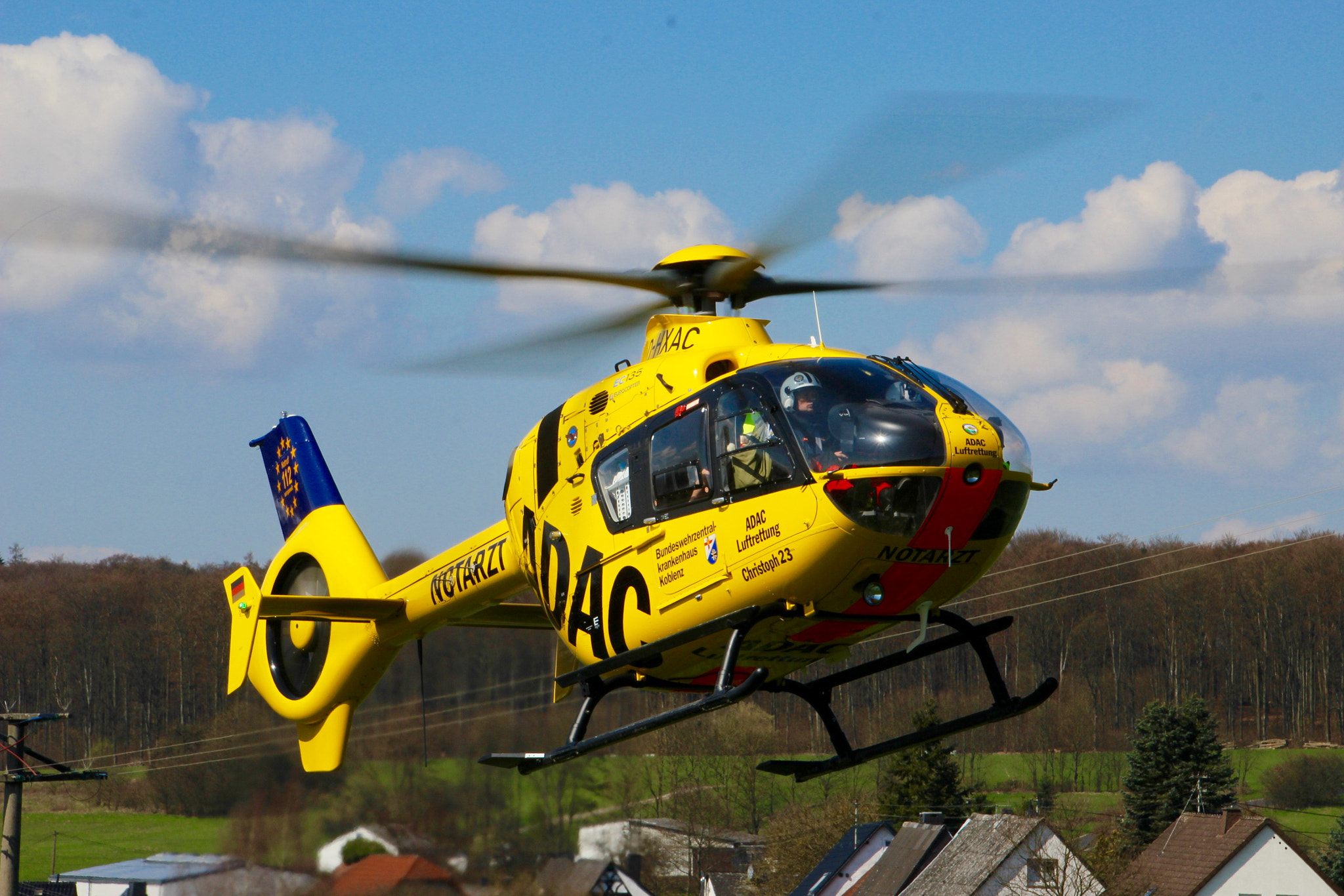 Canon EOS 600D (Rebel EOS T3i / EOS Kiss X5) + Canon 18-270mm sample photo. "christoph 23" - rescue helicopter from germany photography