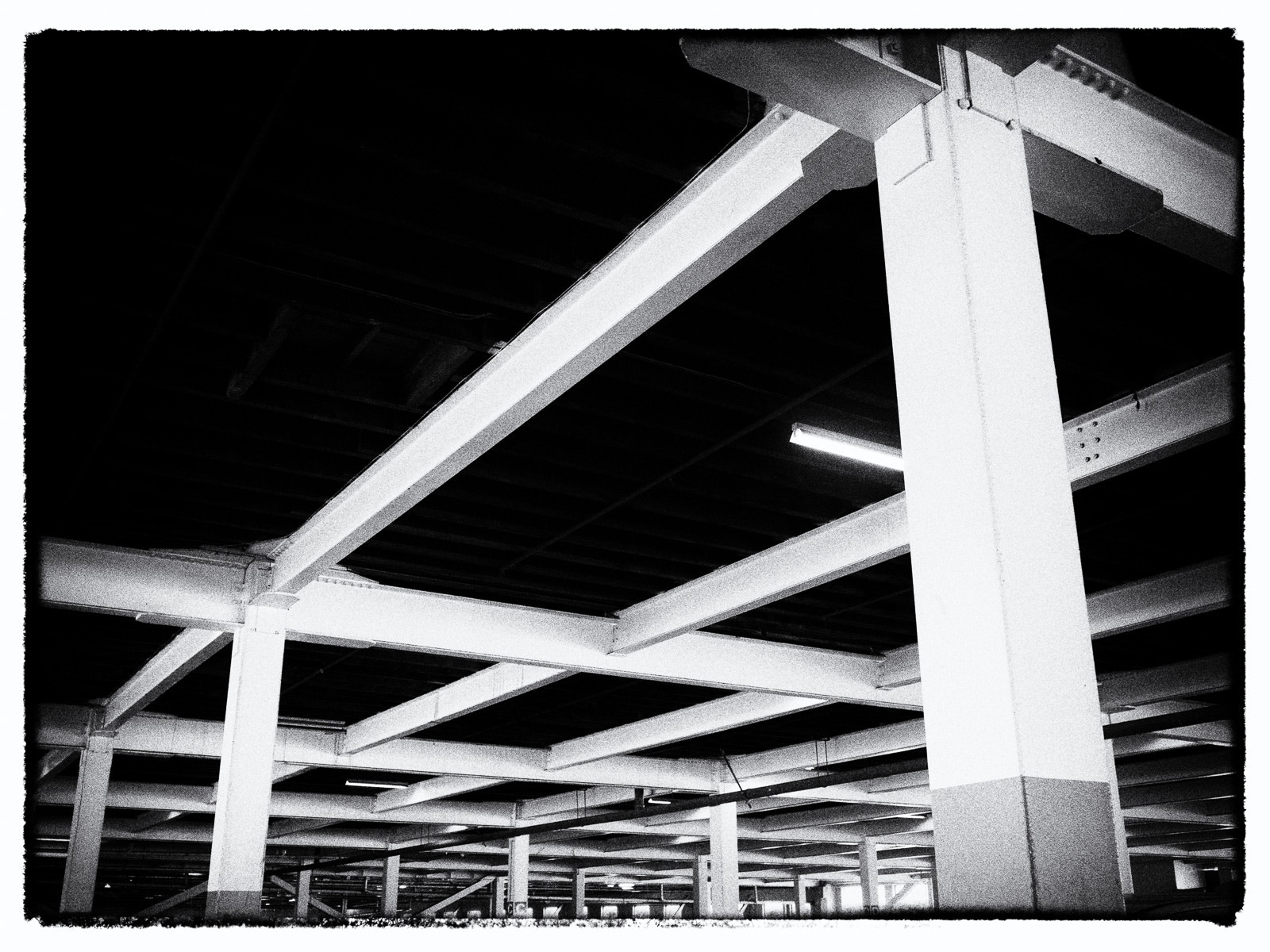 Olympus OM-D E-M5 II + Olympus M.Zuiko Digital 17mm F2.8 Pancake sample photo. Carpark crisscross photography